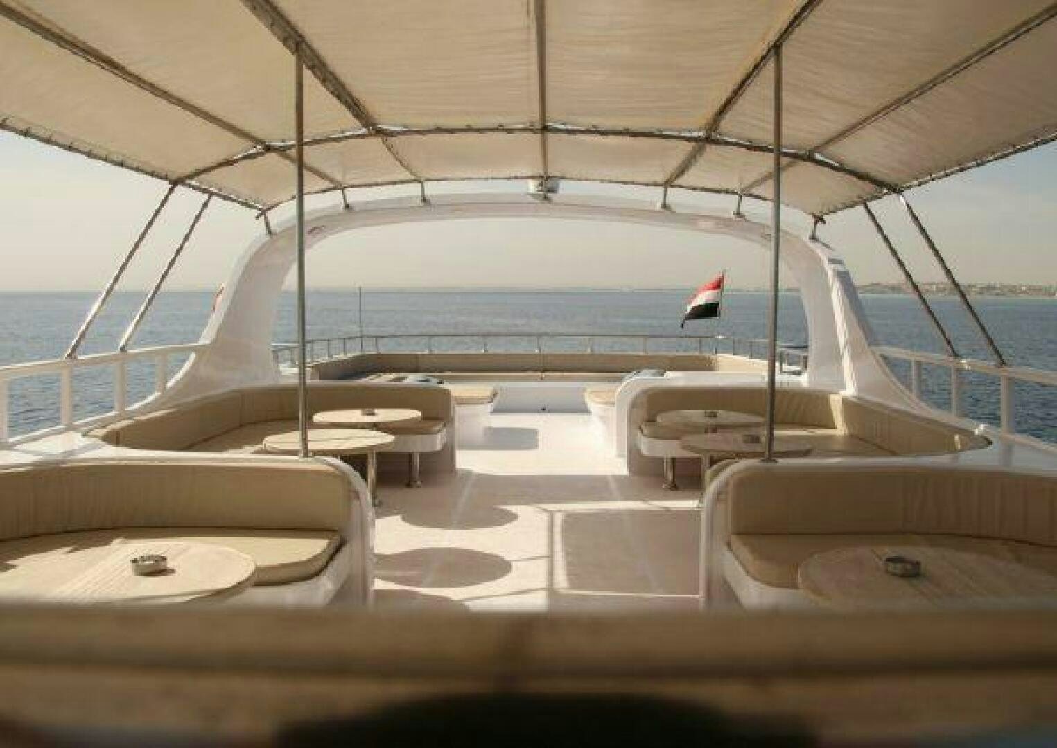 a boat with a flag on the front aboard RED SEA QUEEN Yacht for Sale