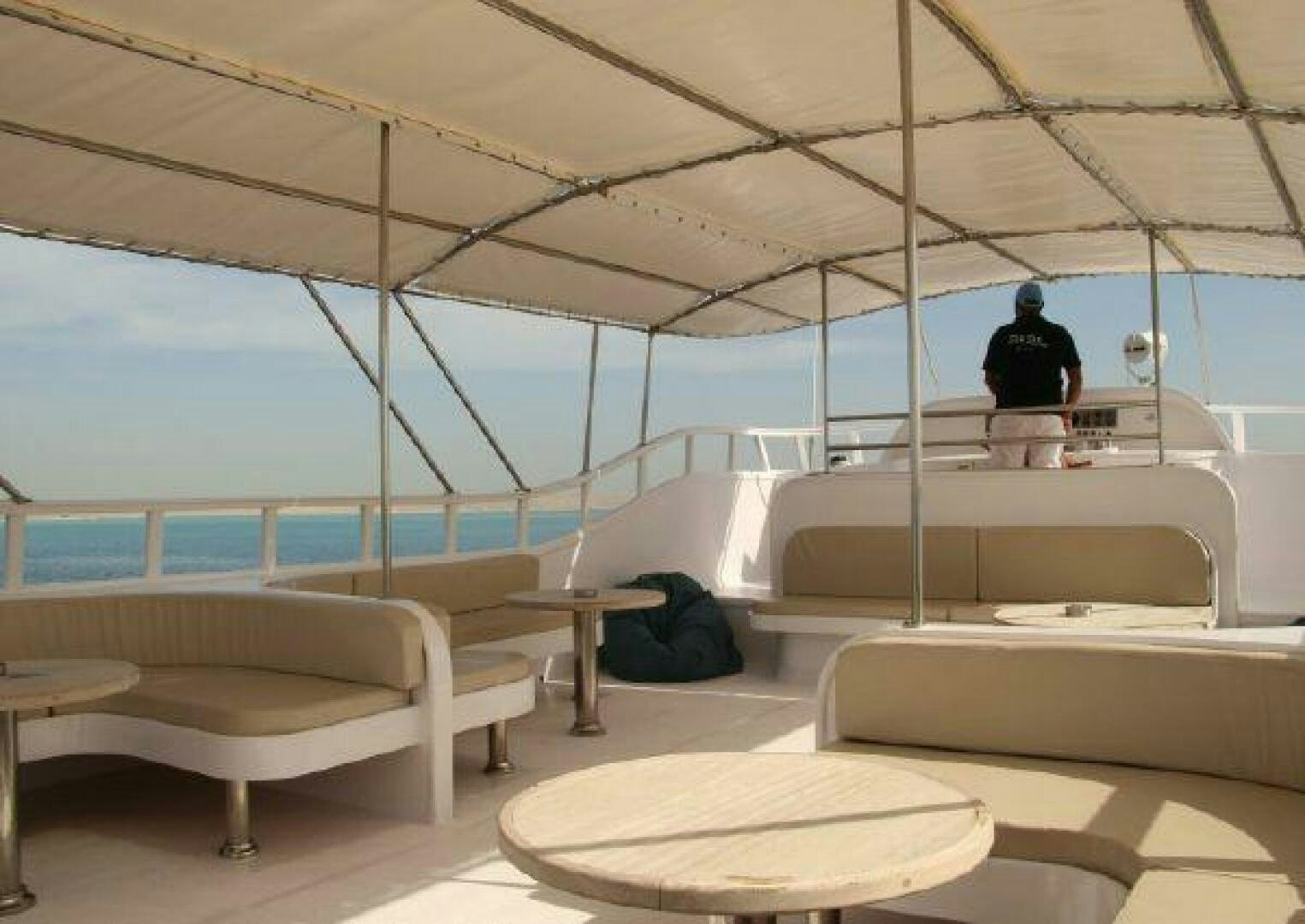 a person standing in a room aboard RED SEA QUEEN Yacht for Sale