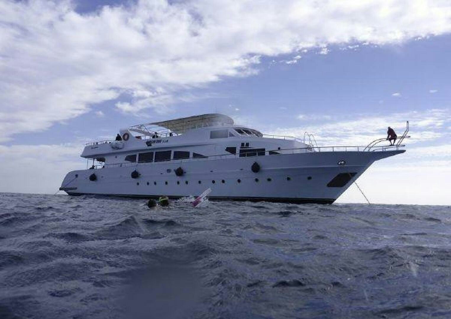 a white yacht in the water aboard RED SEA QUEEN Yacht for Sale