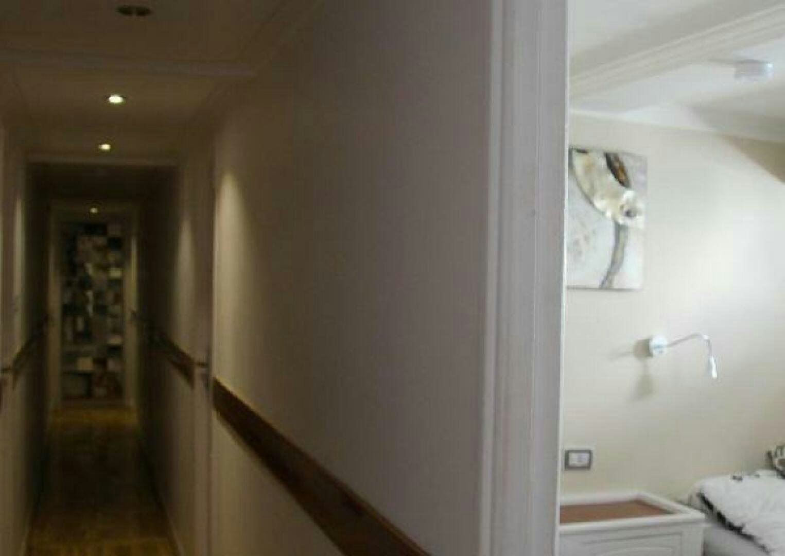 a mirror hangs on a wall aboard RED SEA QUEEN Yacht for Sale