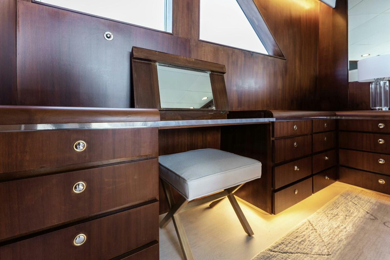 a room with a bed and a desk aboard ARIES Yacht for Sale