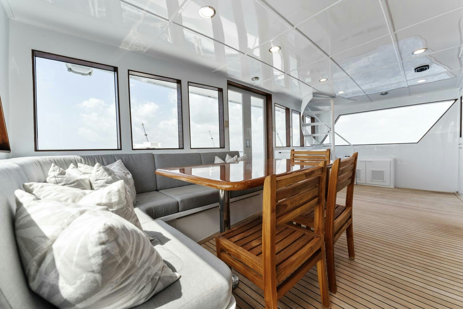 a room with a couch and a table aboard ARIES Yacht for Sale