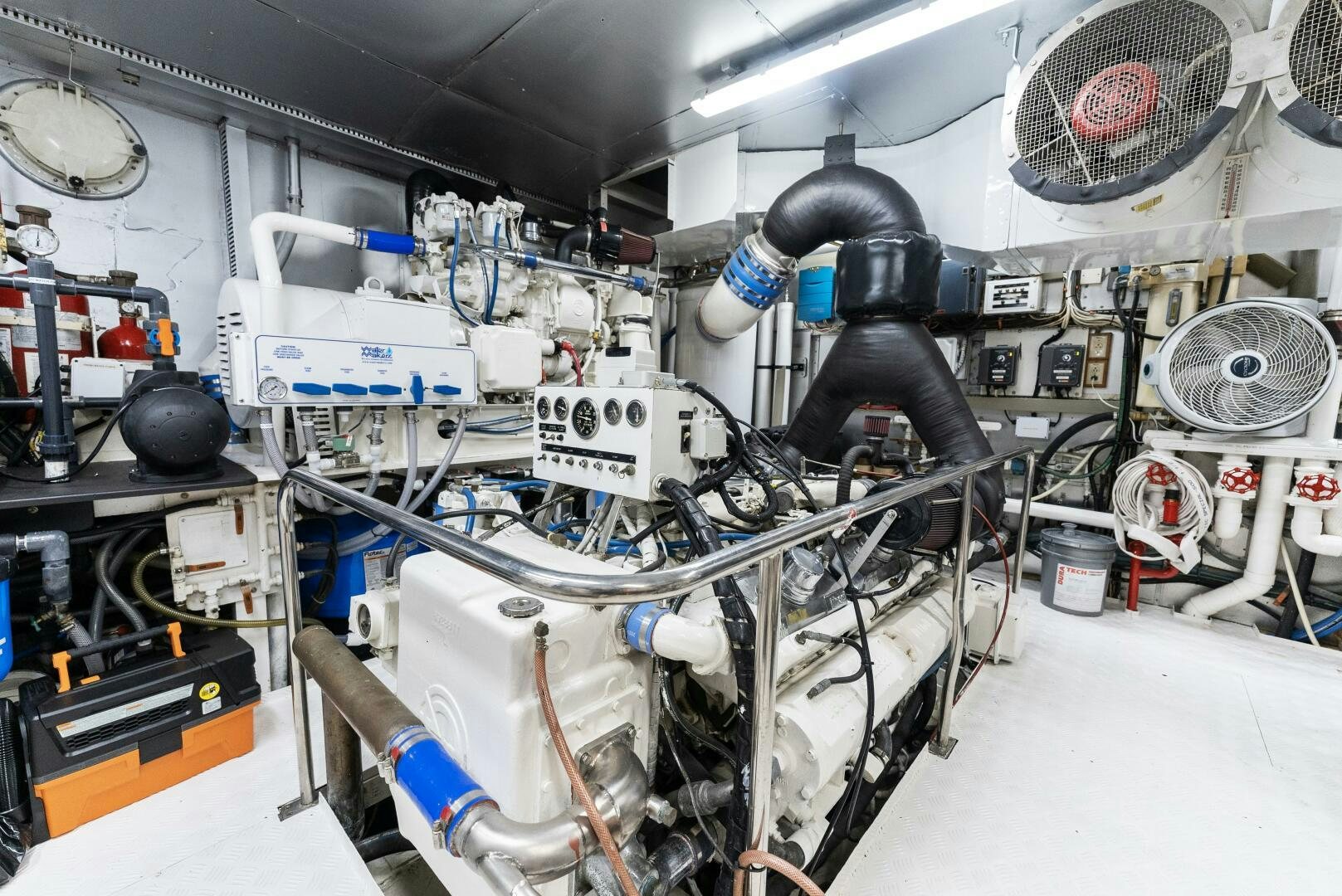 a room with machinery and pipes aboard ARIES Yacht for Sale