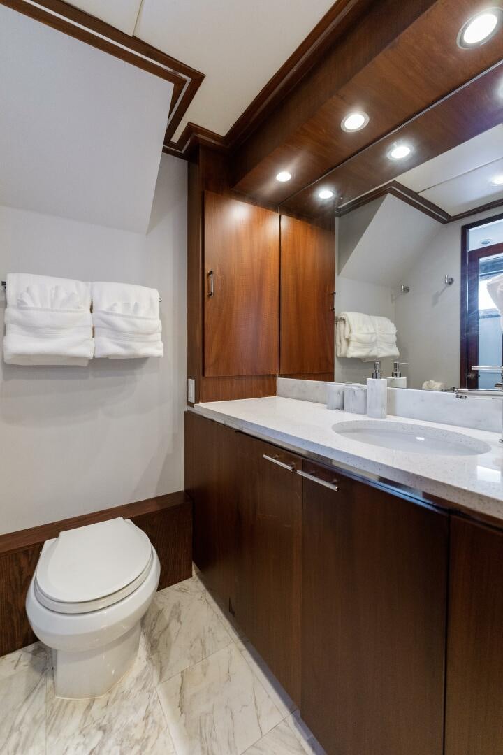 a bathroom with a sink and a toilet aboard ARIES Yacht for Sale
