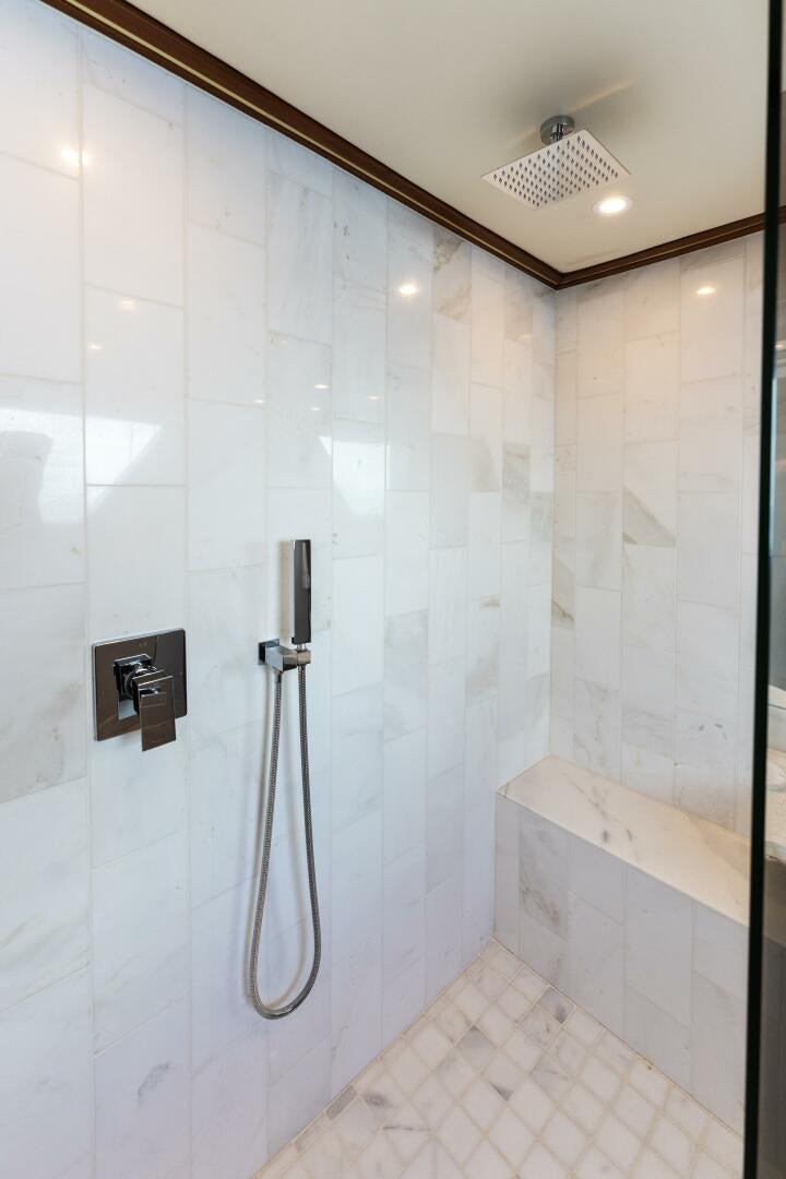 a shower with a shower head aboard ARIES Yacht for Sale