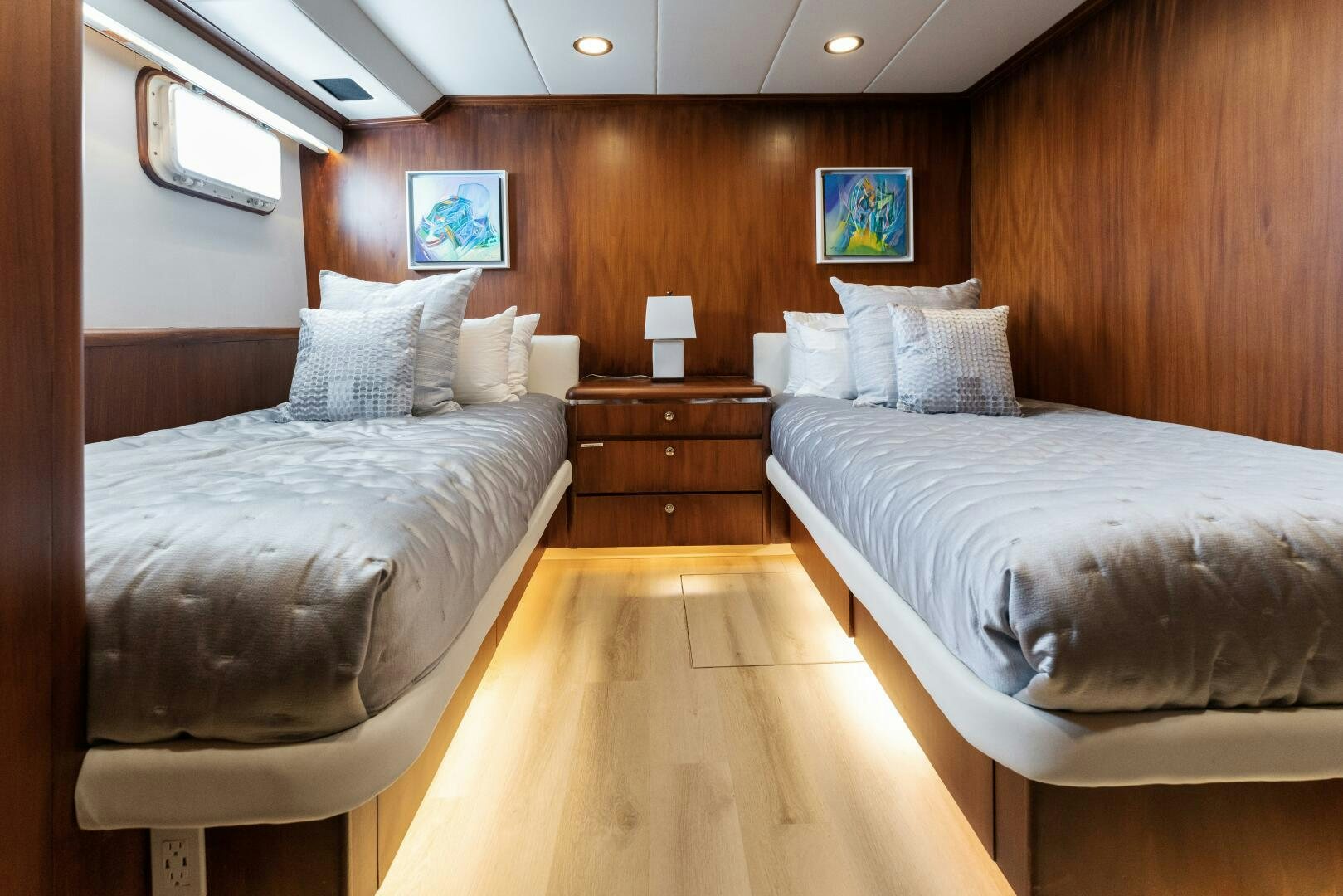 a room with two beds aboard ARIES Yacht for Sale