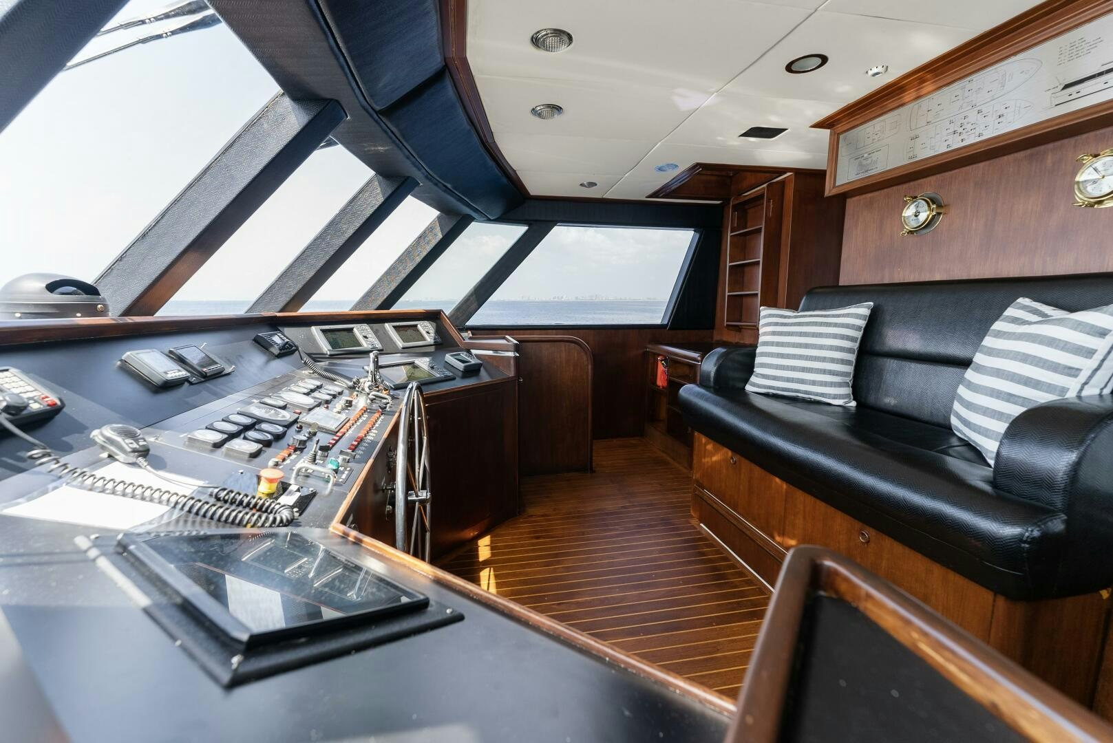 a room with a piano and a piano aboard ARIES Yacht for Sale