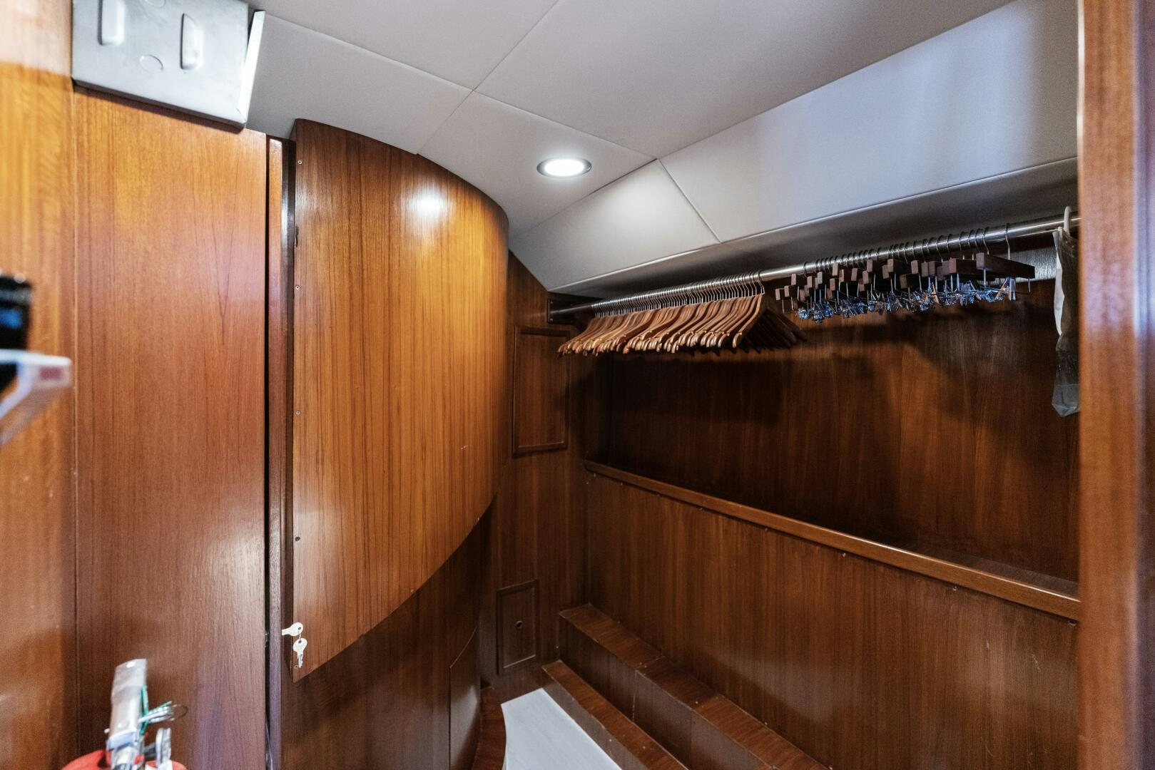 a wooden cabinet in a room aboard ARIES Yacht for Sale