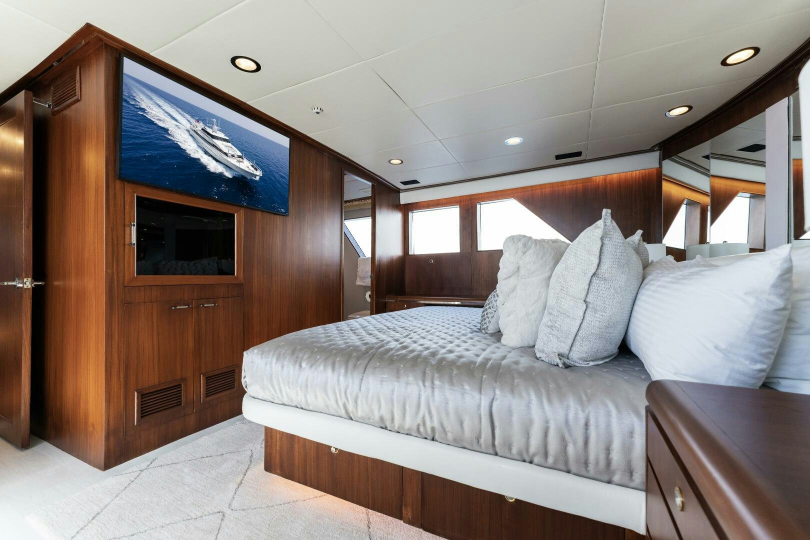 a bed in a room aboard ARIES Yacht for Sale