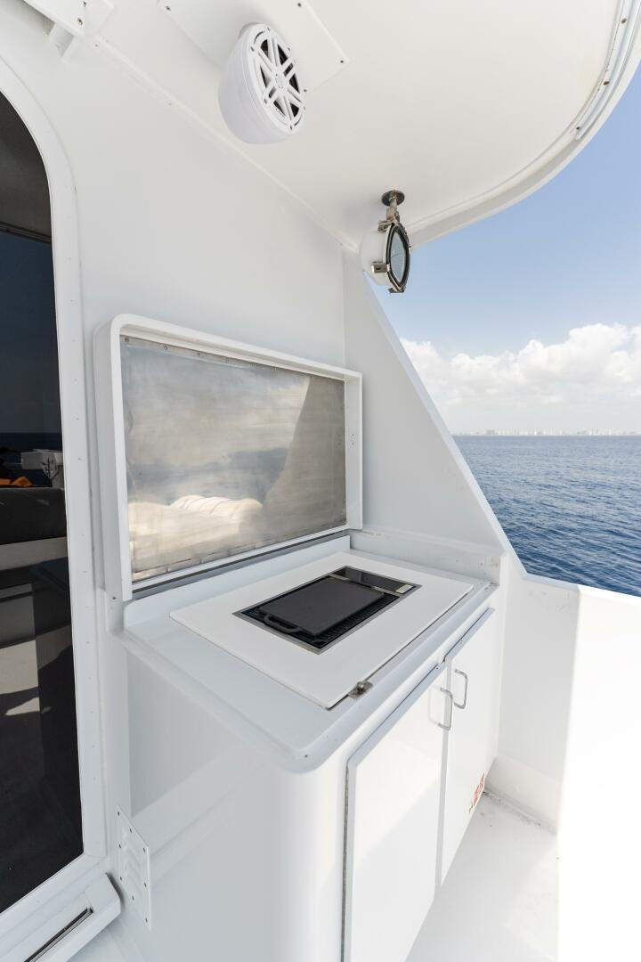 a white machine with a screen aboard ARIES Yacht for Sale