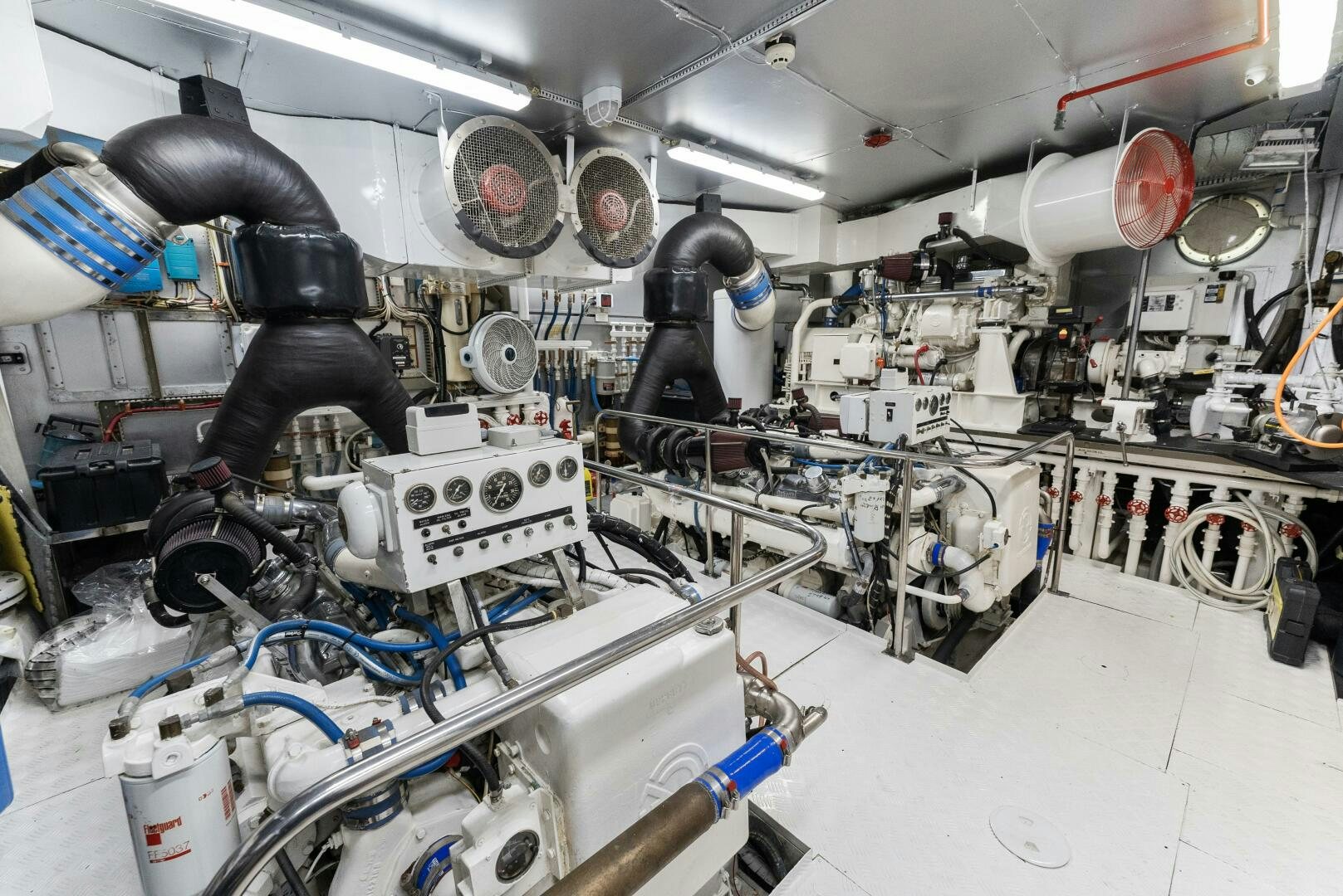 a room with machinery and pipes aboard ARIES Yacht for Sale