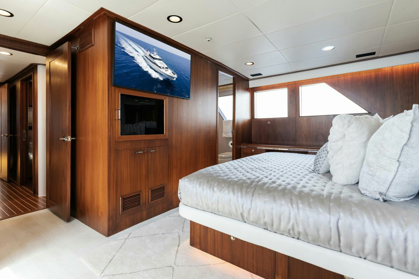a bed in a room aboard ARIES Yacht for Sale