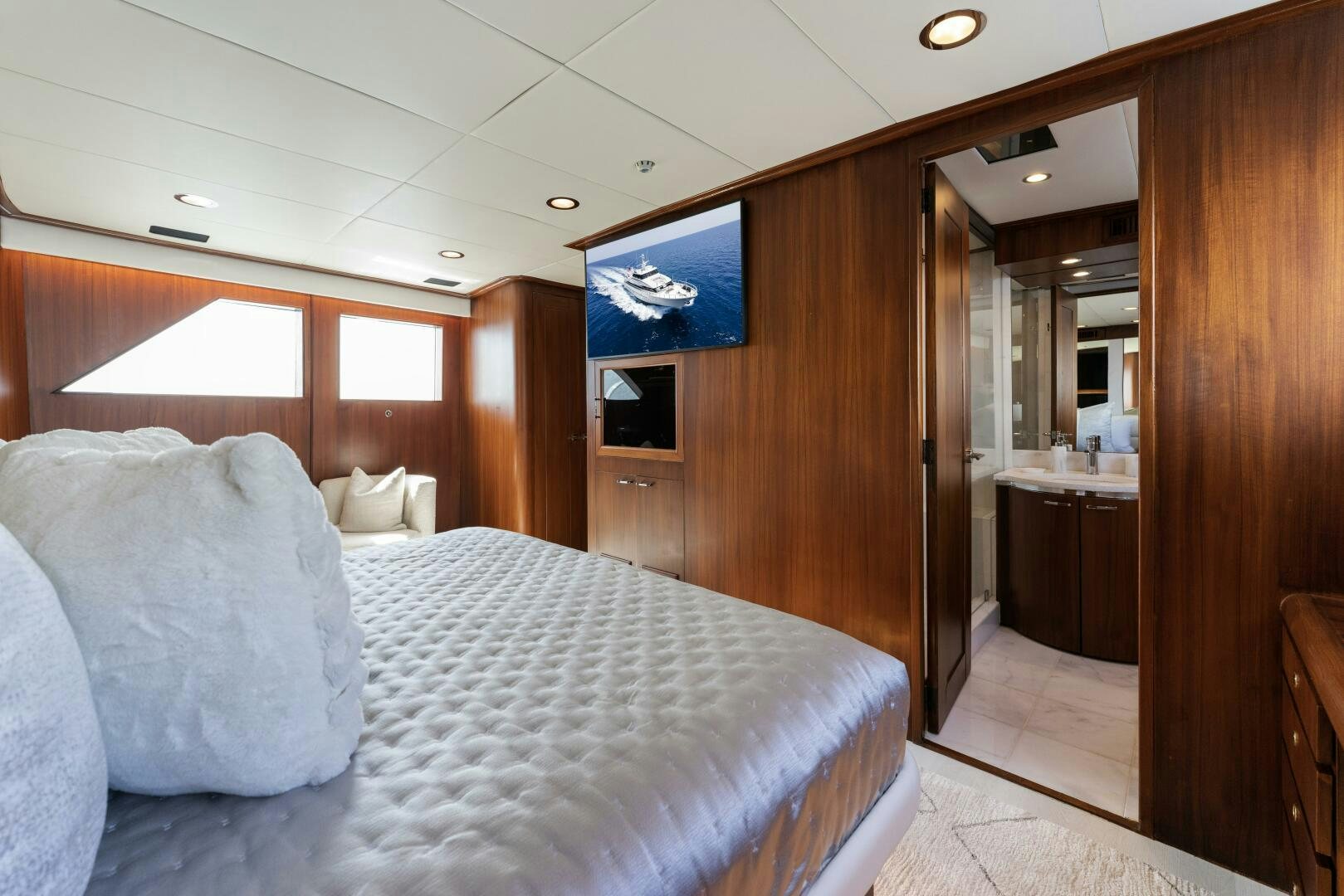 a bed in a room aboard ARIES Yacht for Sale