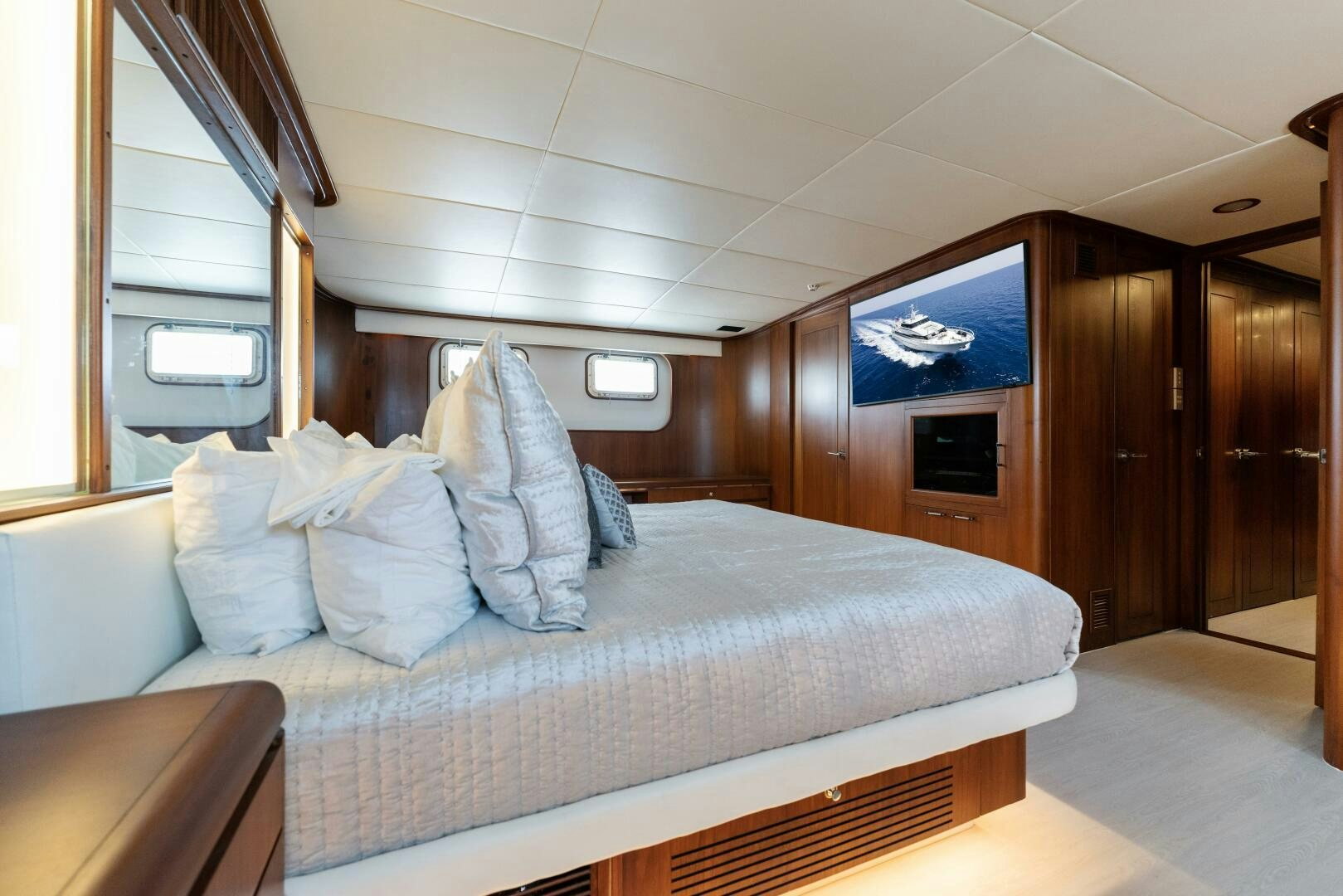 a bed in a room aboard ARIES Yacht for Sale