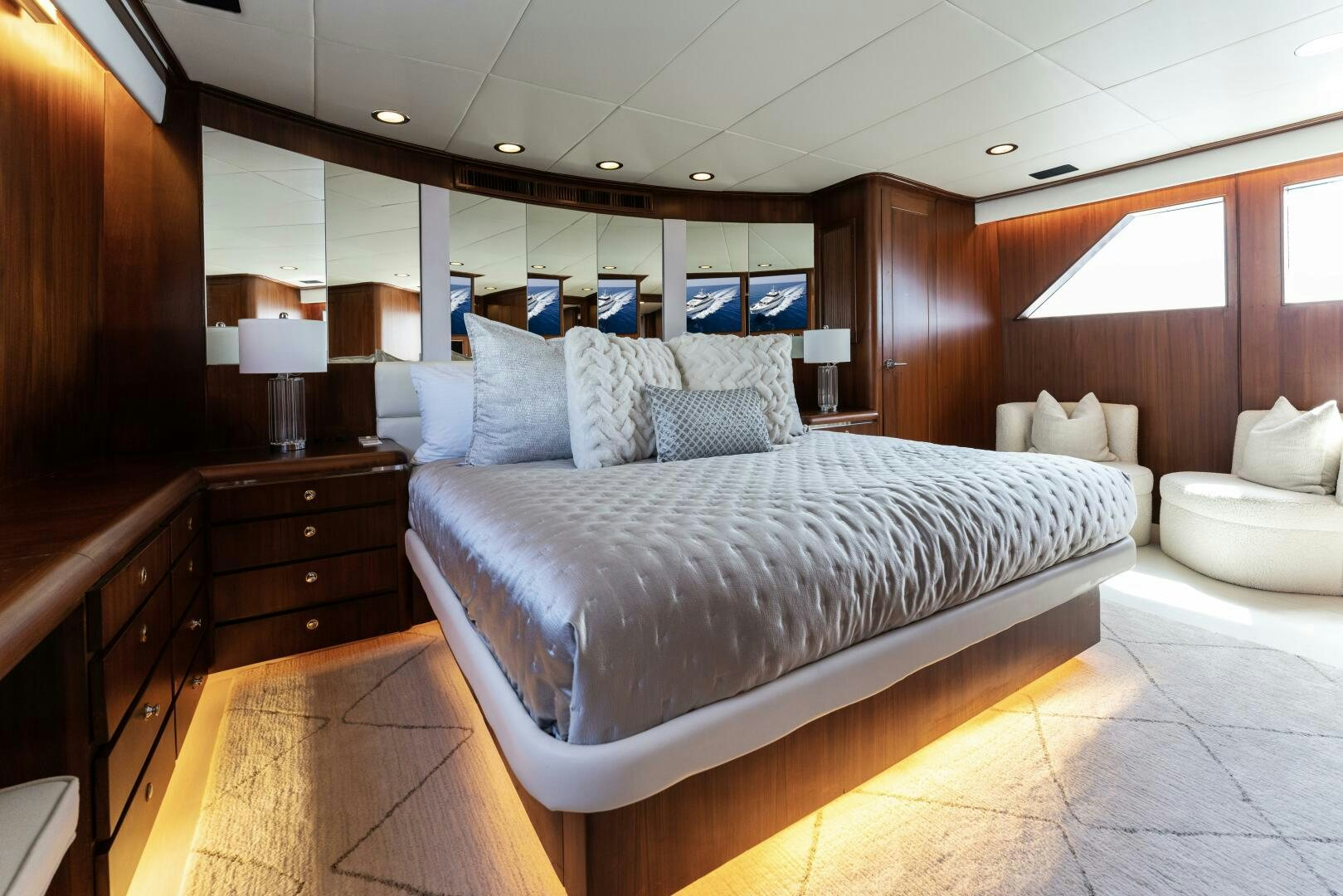 a large bed in a room aboard ARIES Yacht for Sale