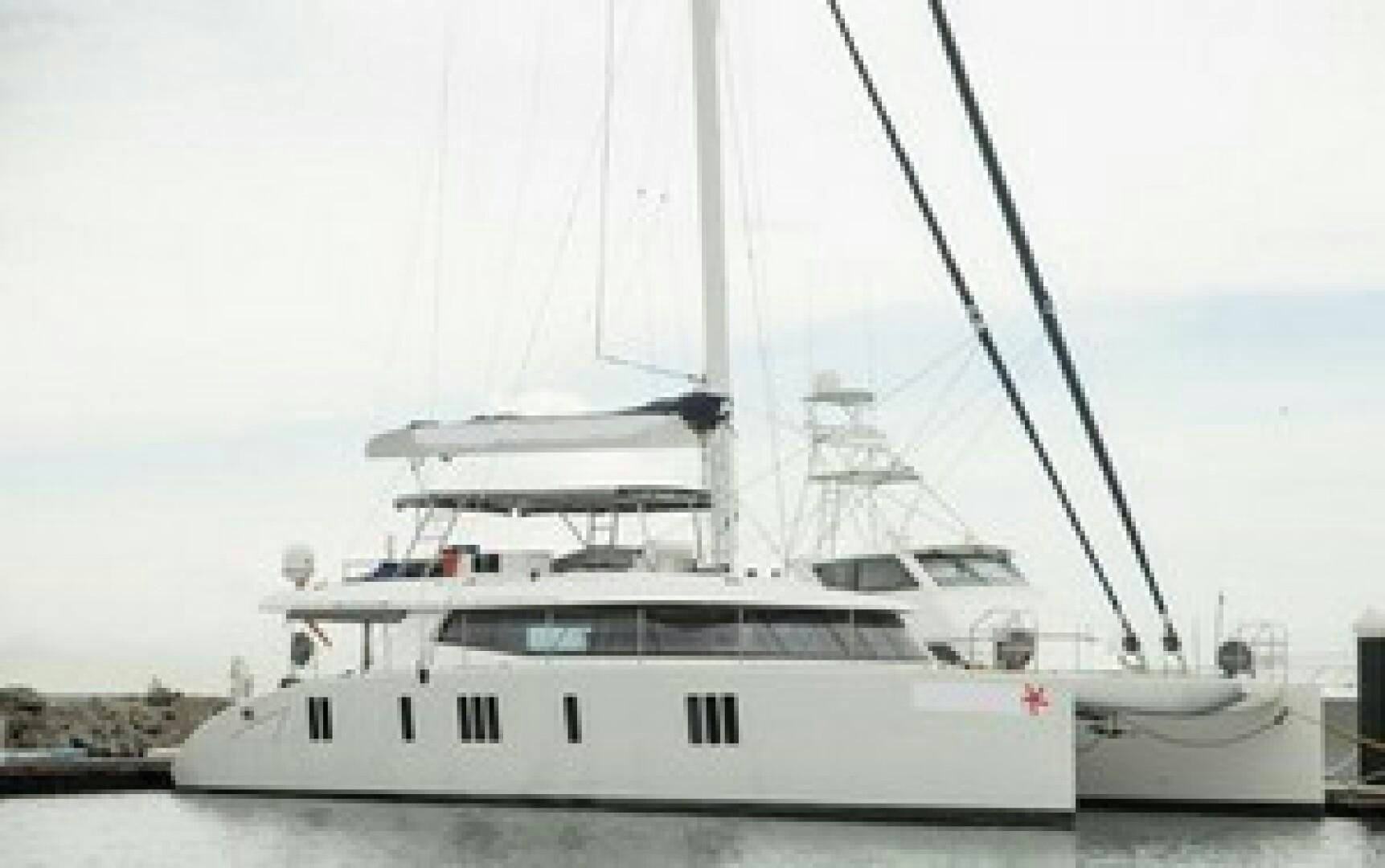 a white boat in the water aboard KAILUA Yacht for Sale