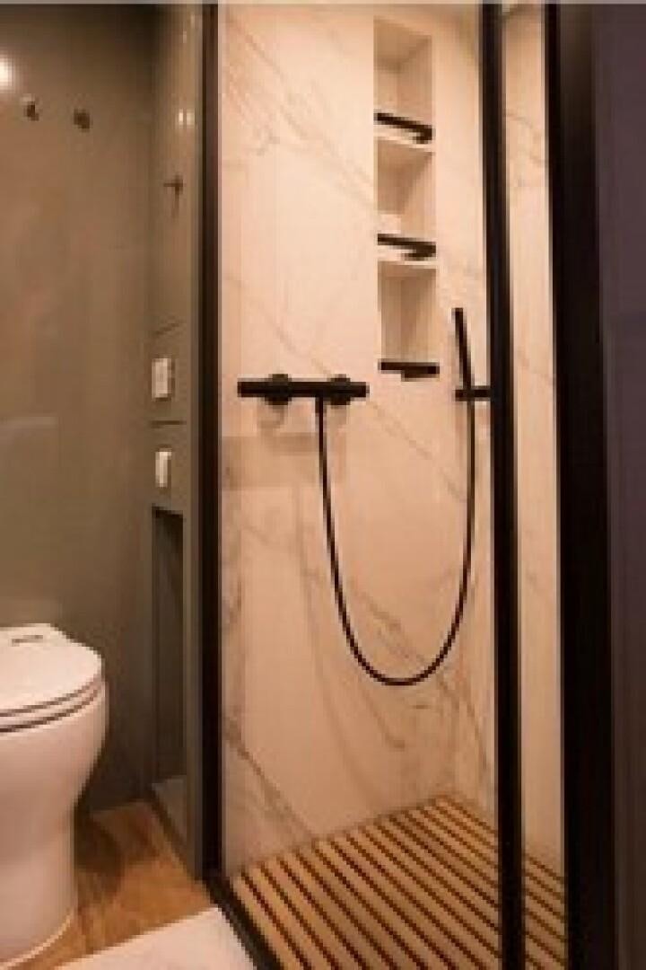 a bathroom with a shower aboard KAILUA Yacht for Sale