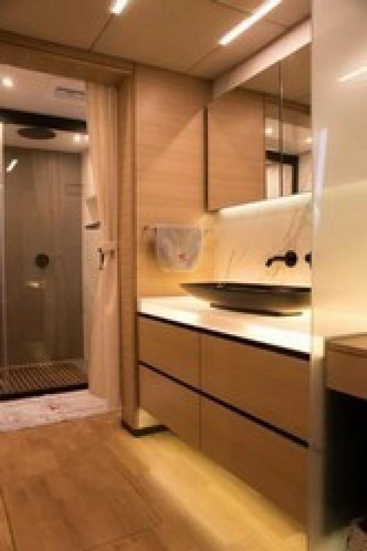 a kitchen with a sink and cabinets aboard KAILUA Yacht for Sale