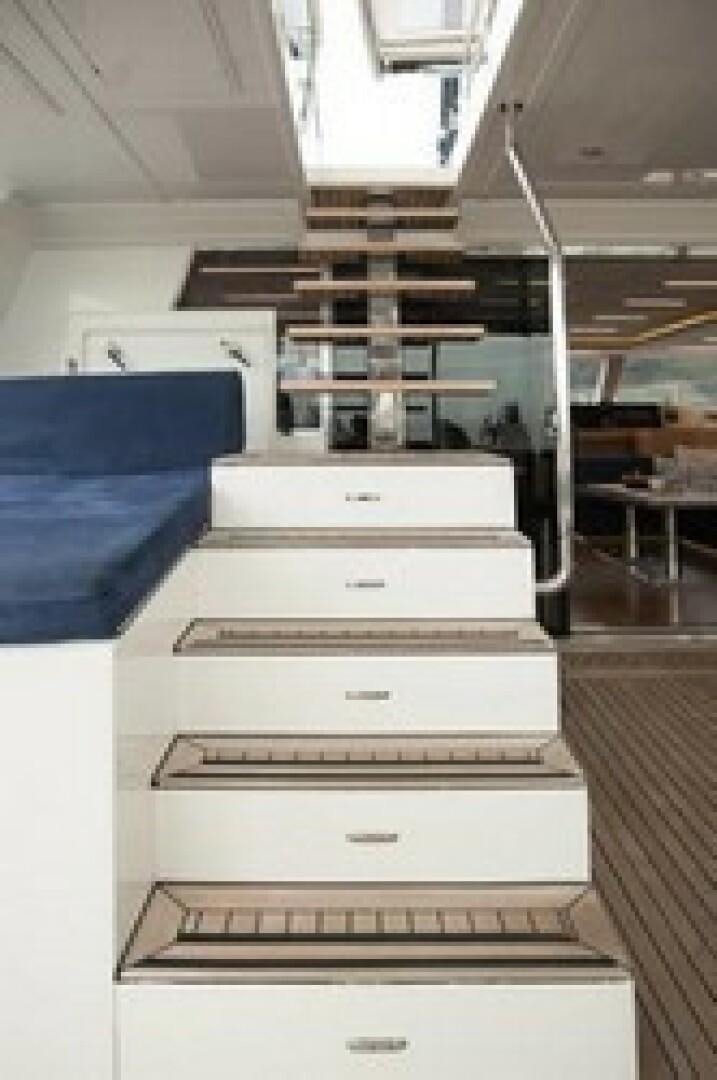 a white cabinet with drawers aboard KAILUA Yacht for Sale
