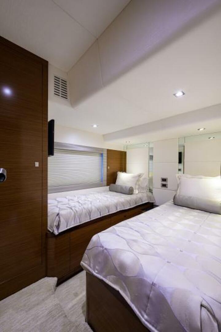 a room with two beds aboard JOHN BOAT Yacht for Sale