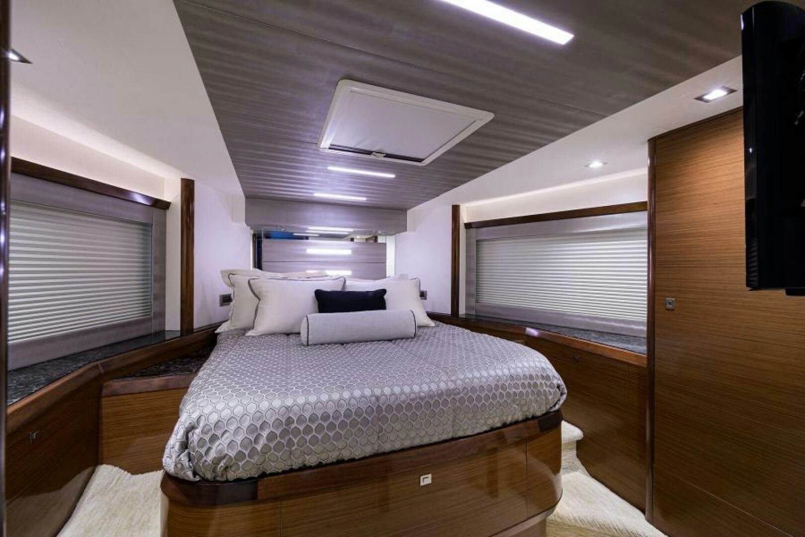 a bed in a room aboard JOHN BOAT Yacht for Sale