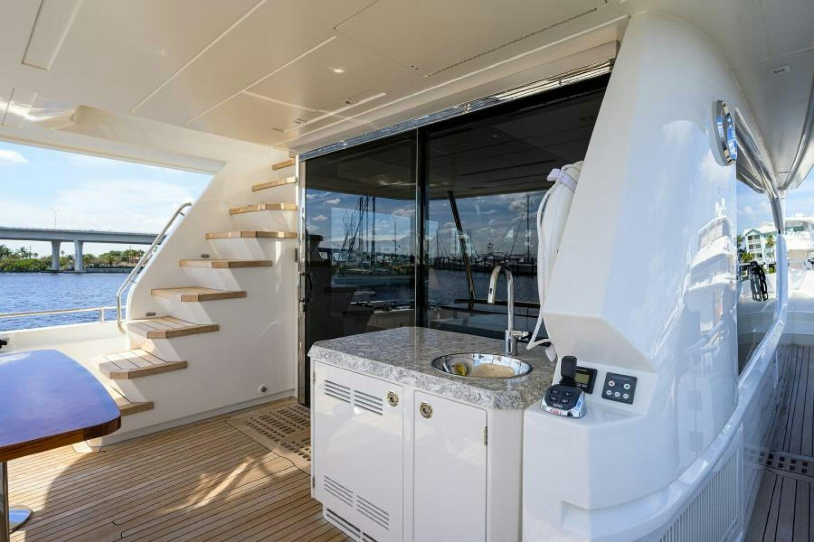 a room with a sink and a bed aboard JOHN BOAT Yacht for Sale
