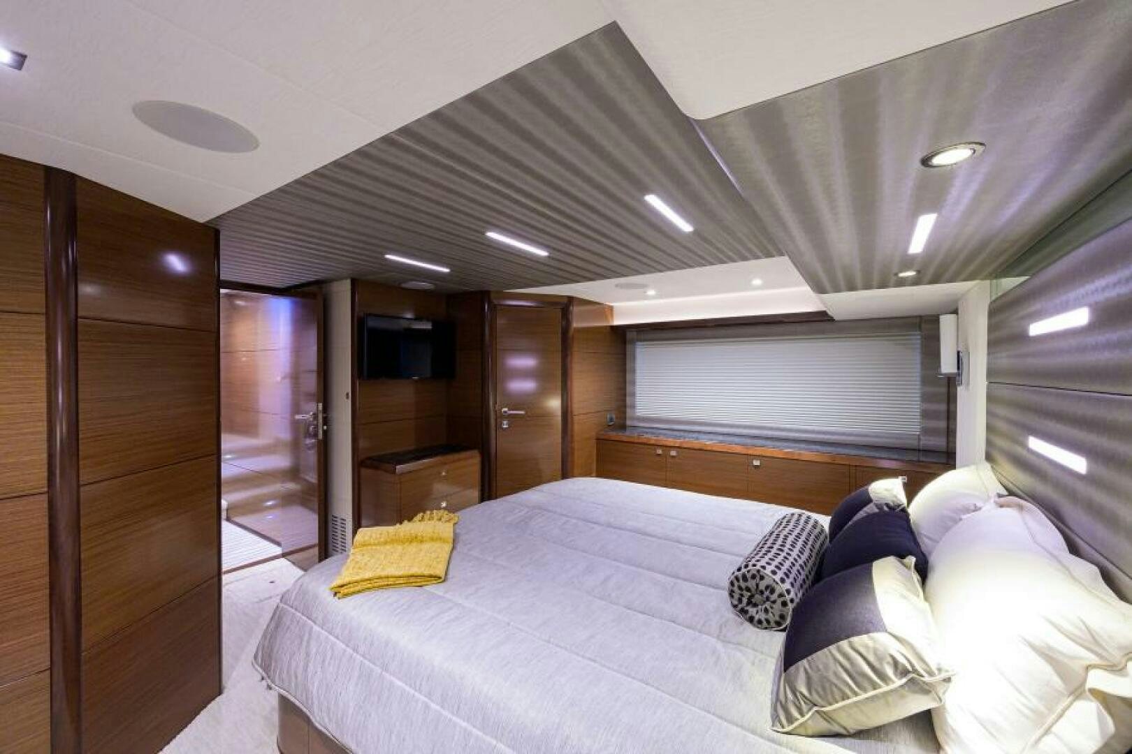 a bed in a room aboard JOHN BOAT Yacht for Sale