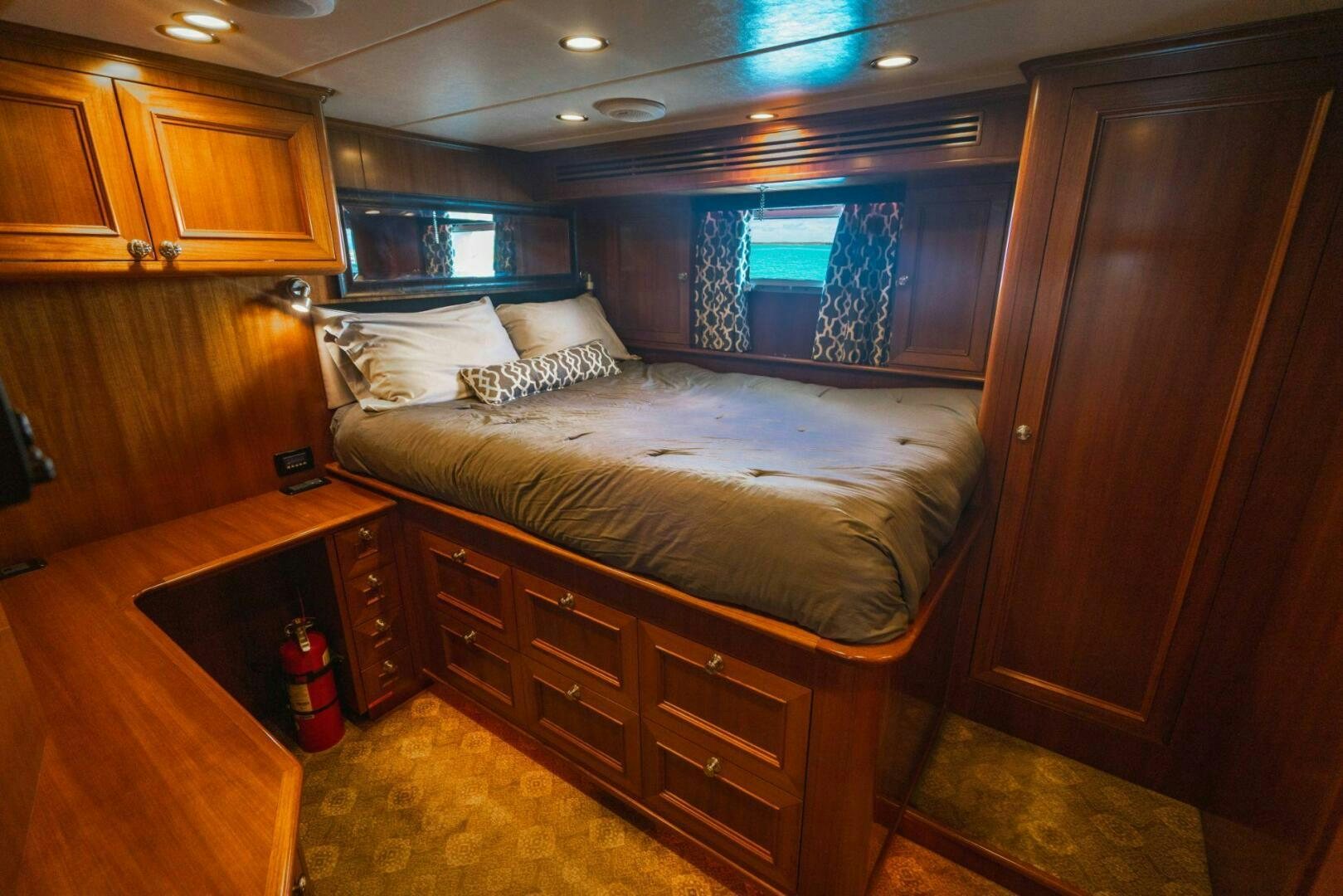 a bed in a room aboard MOONSHOT Yacht for Sale