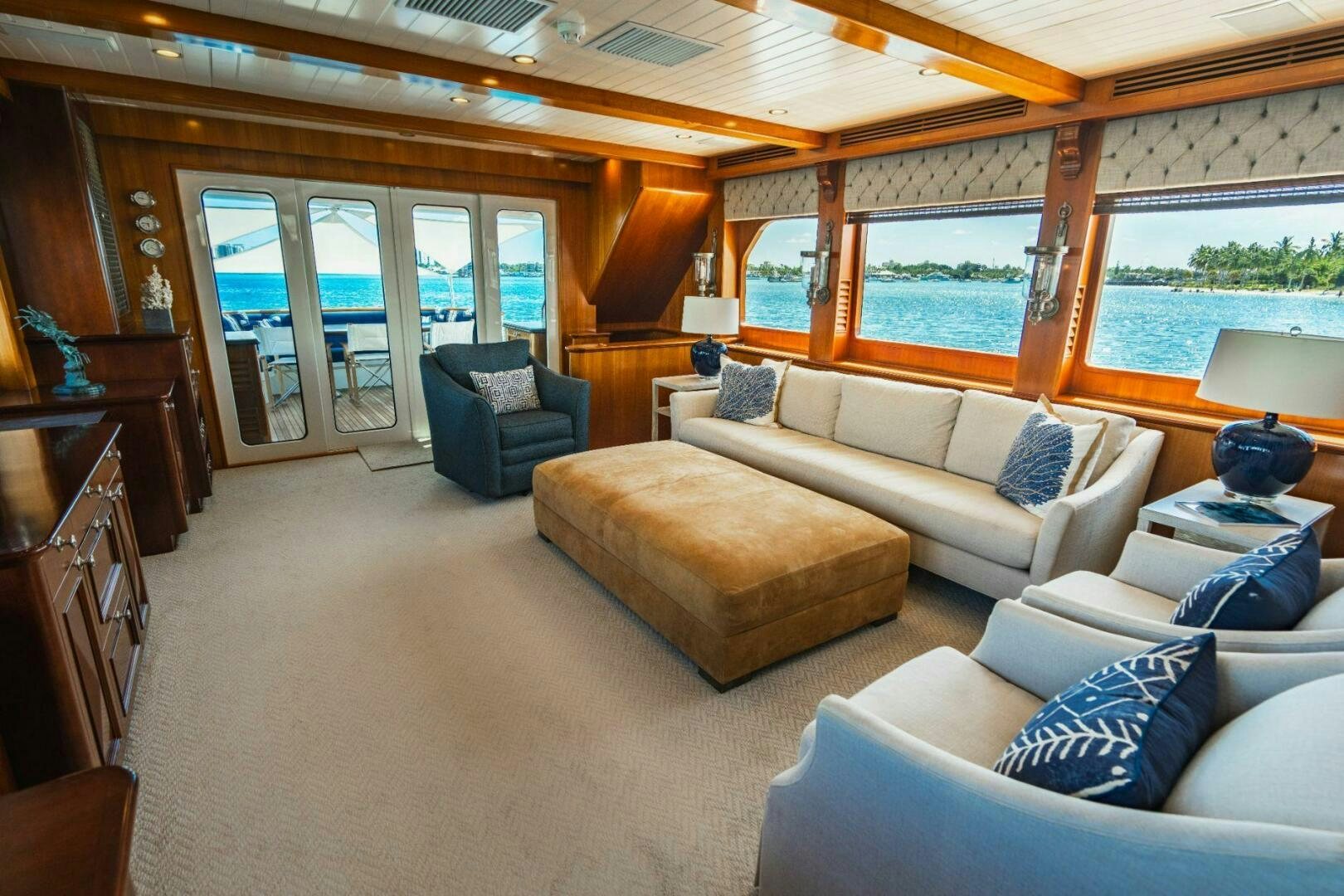a living room with a large window aboard MOONSHOT Yacht for Sale