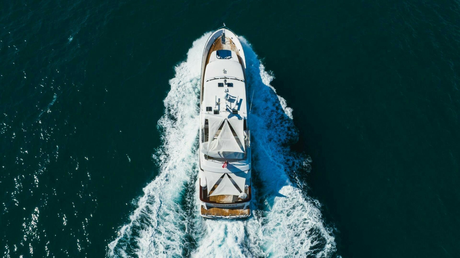 a space shuttle in space aboard MOONSHOT Yacht for Sale