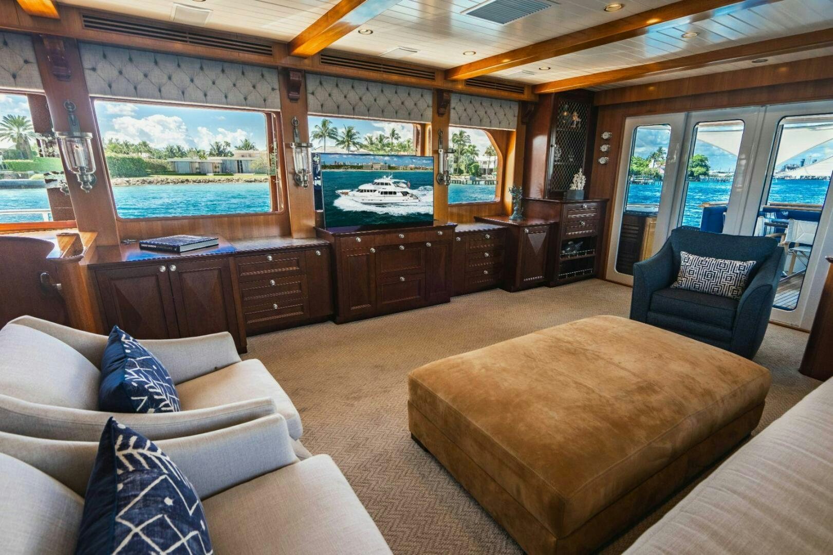 a living room with a large window aboard MOONSHOT Yacht for Sale