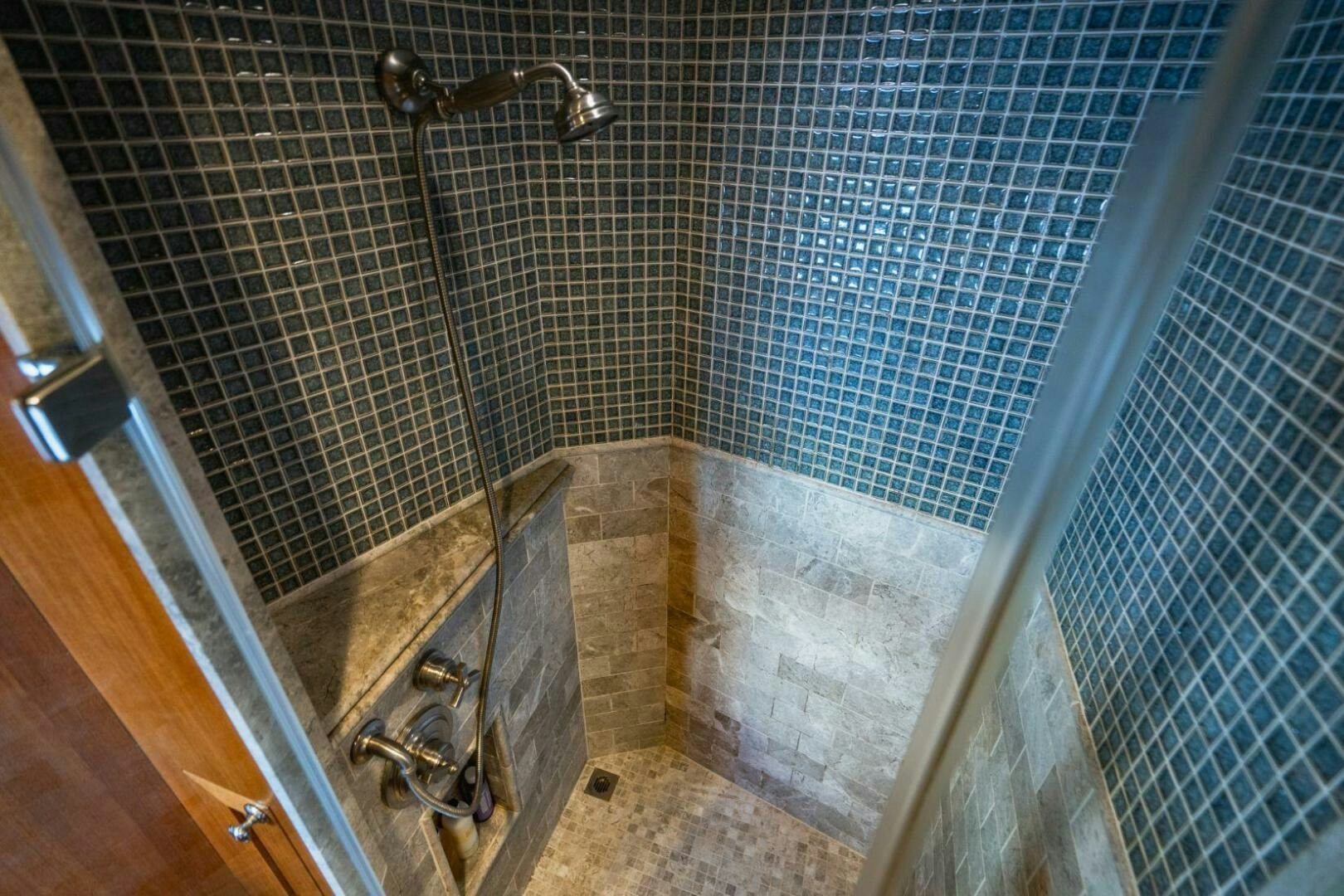 a bathroom with a shower aboard MOONSHOT Yacht for Sale