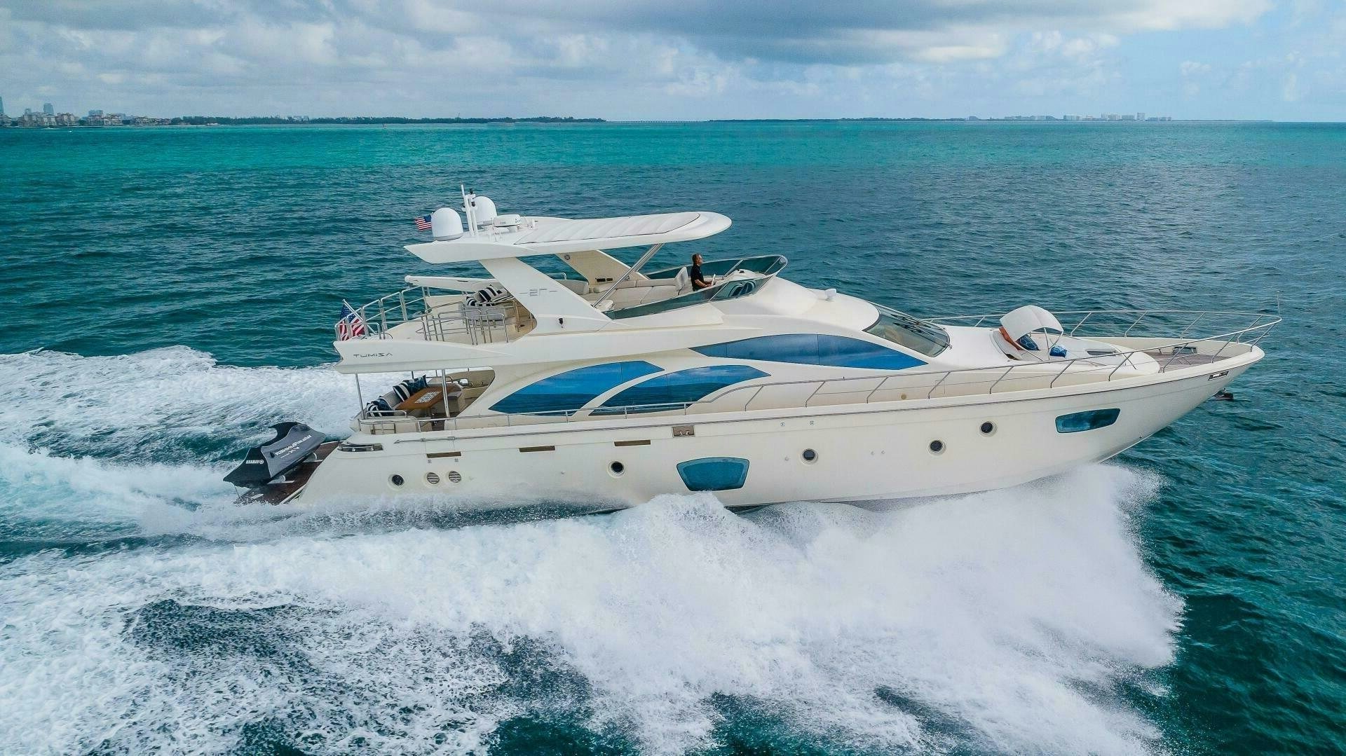 a boat on the water aboard MINIMAL RISK Yacht for Sale