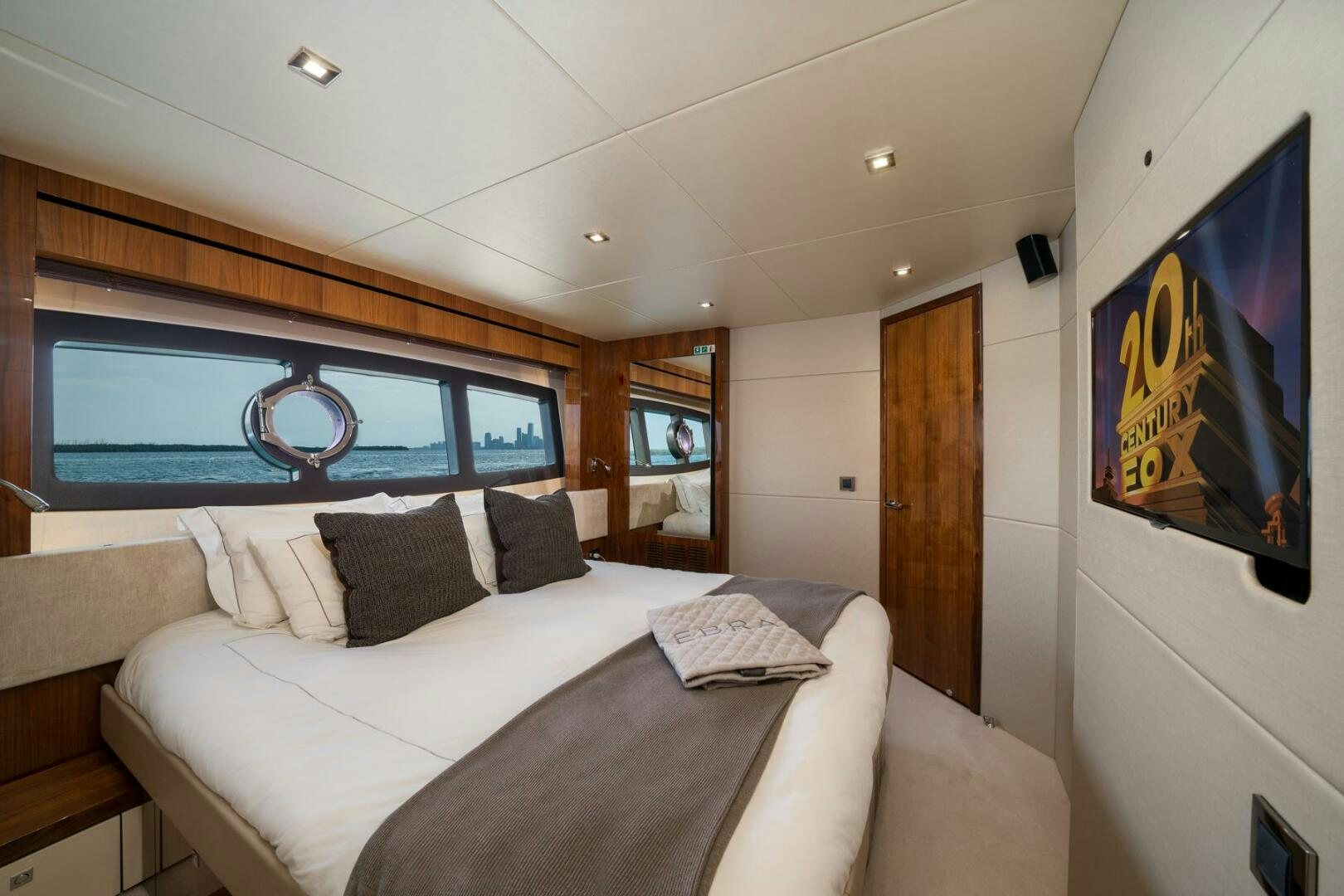 a bed in a room aboard EBRA Yacht for Sale