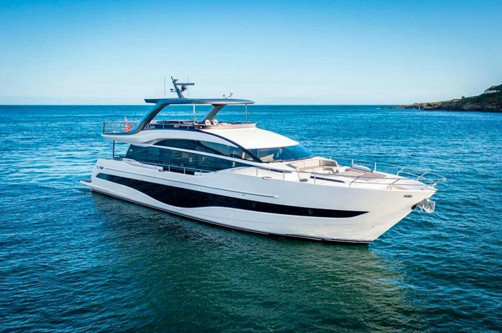 a white yacht in the water aboard SIDURI III  Yacht for Sale