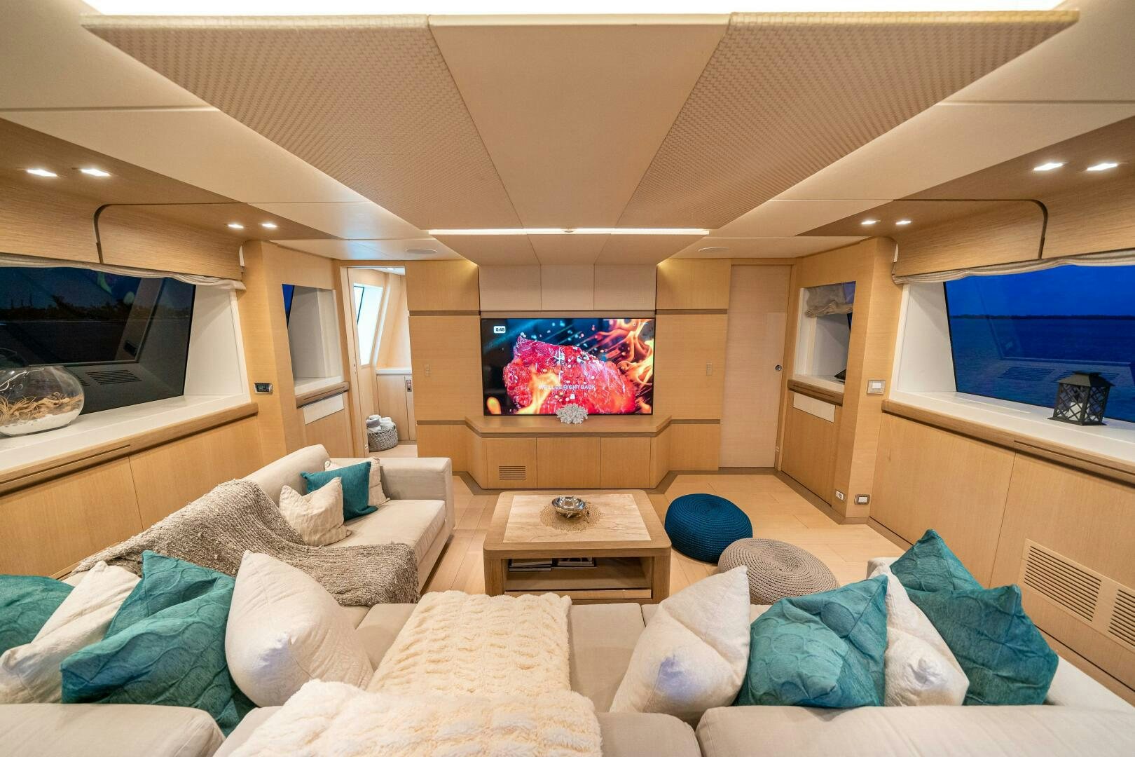 a living room with a couch and a tv aboard LEUDIN I Yacht for Sale