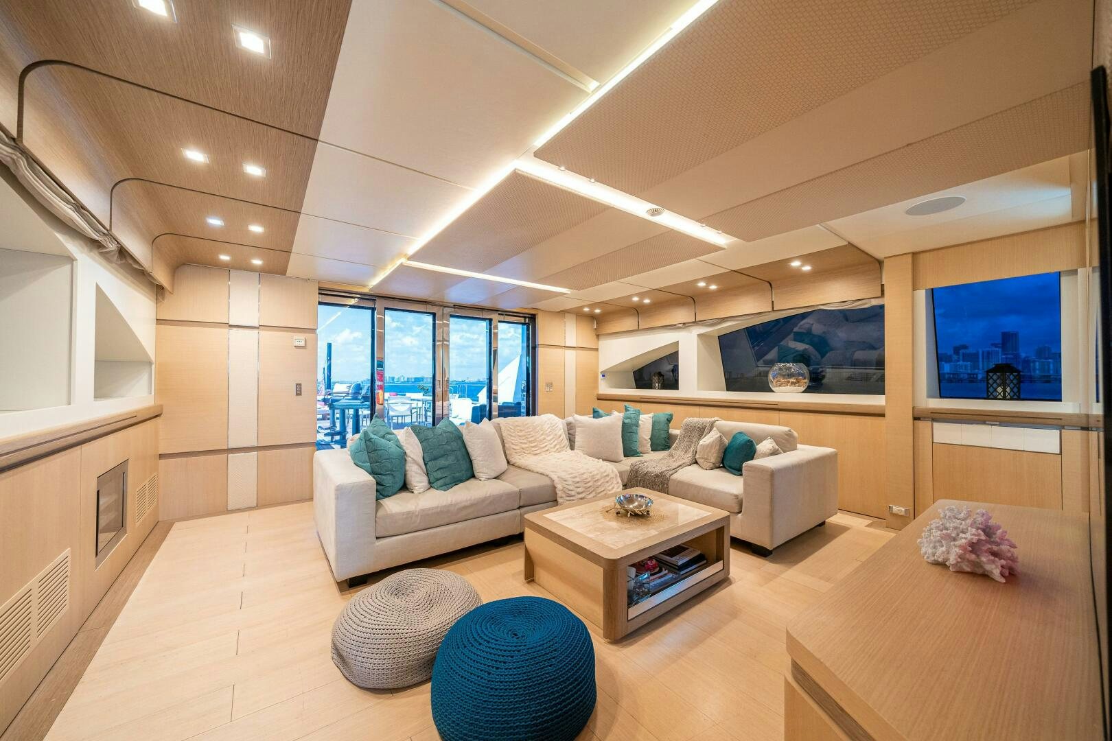 a living room with a large window aboard LEUDIN I Yacht for Sale