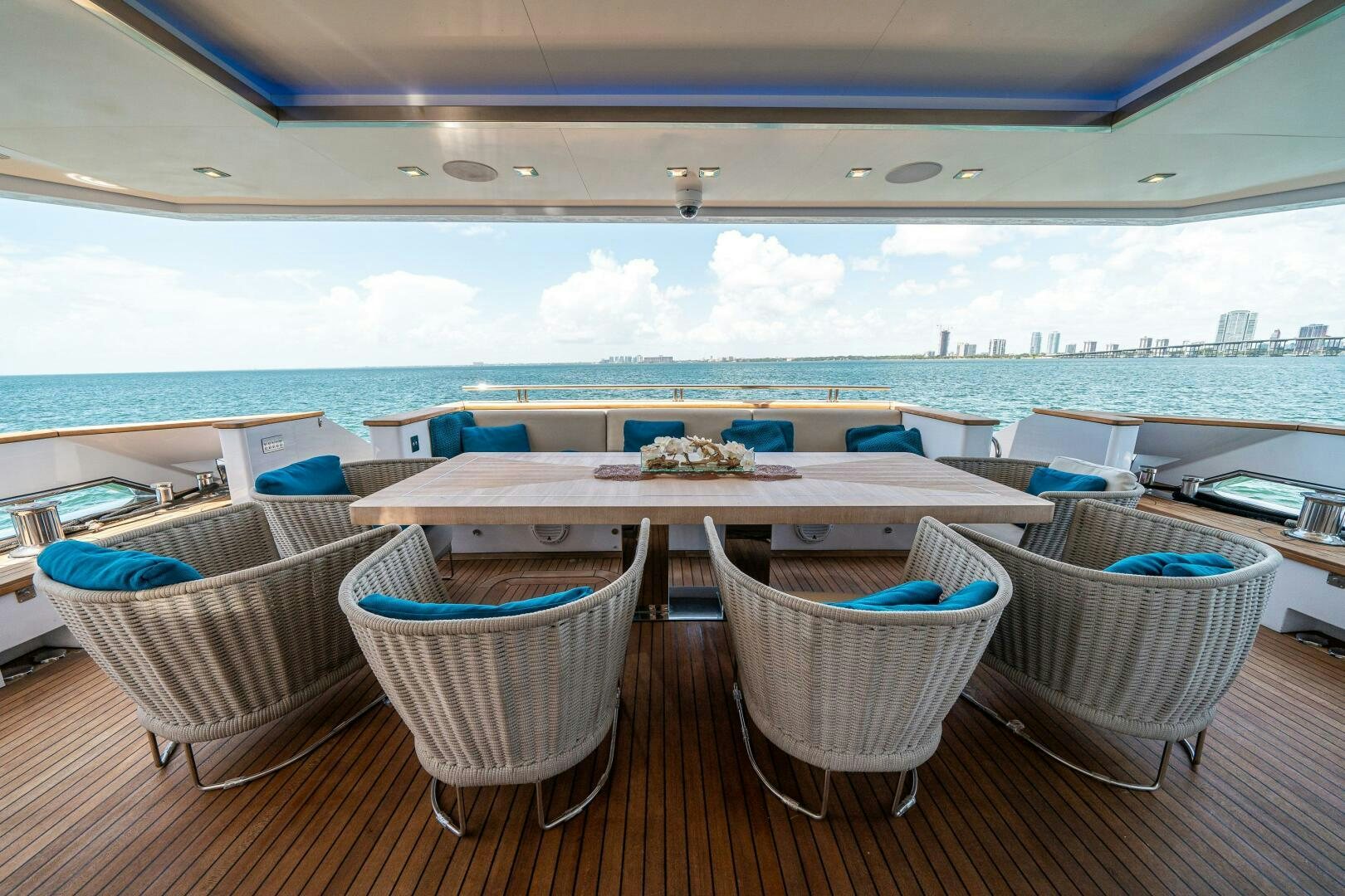 a room with a table and chairs aboard LEUDIN I Yacht for Sale
