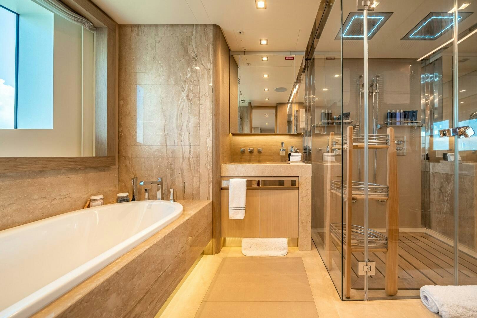 a bathroom with a shower and sink aboard LEUDIN I Yacht for Sale