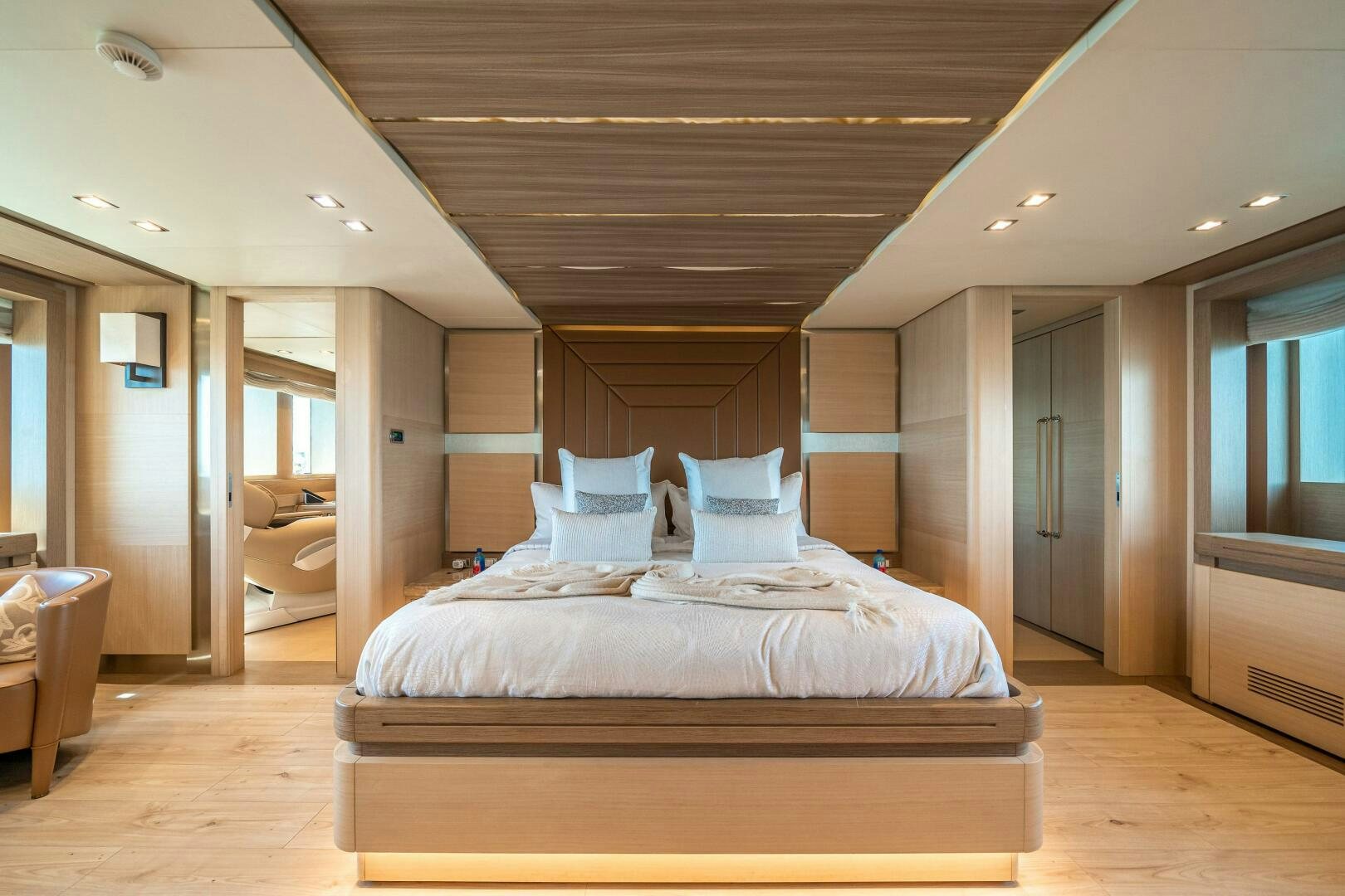 a large bedroom with a large bed aboard LEUDIN I Yacht for Sale