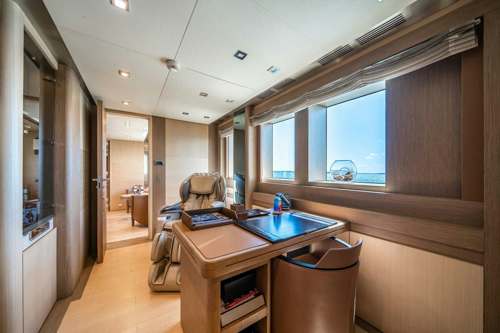 a room with a table and chairs aboard LEUDIN I Yacht for Sale