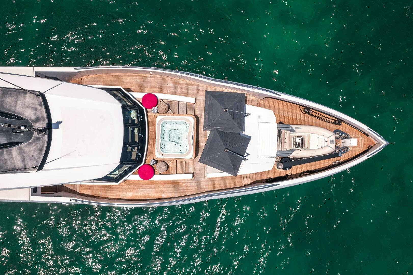 a boat with a red circle on the front aboard LEUDIN I Yacht for Sale
