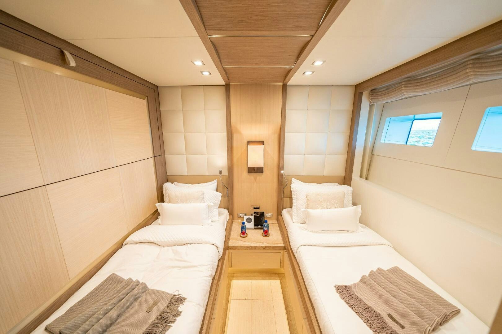 a room with a couple of beds aboard LEUDIN I Yacht for Sale