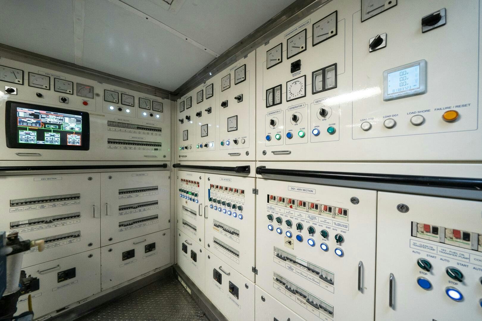 a room with several white cabinets aboard LEUDIN I Yacht for Sale