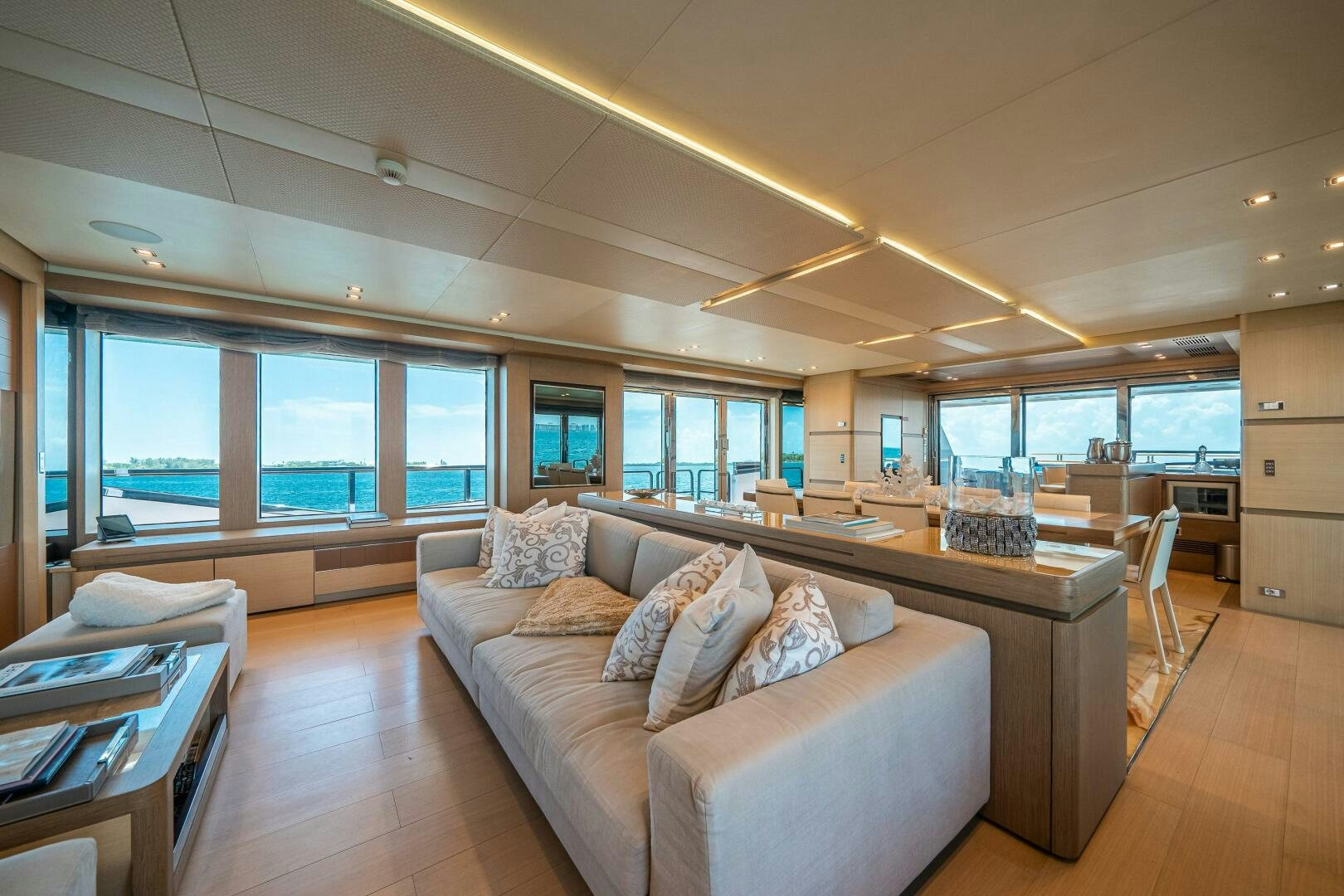 a living room with a large window aboard LEUDIN I Yacht for Sale