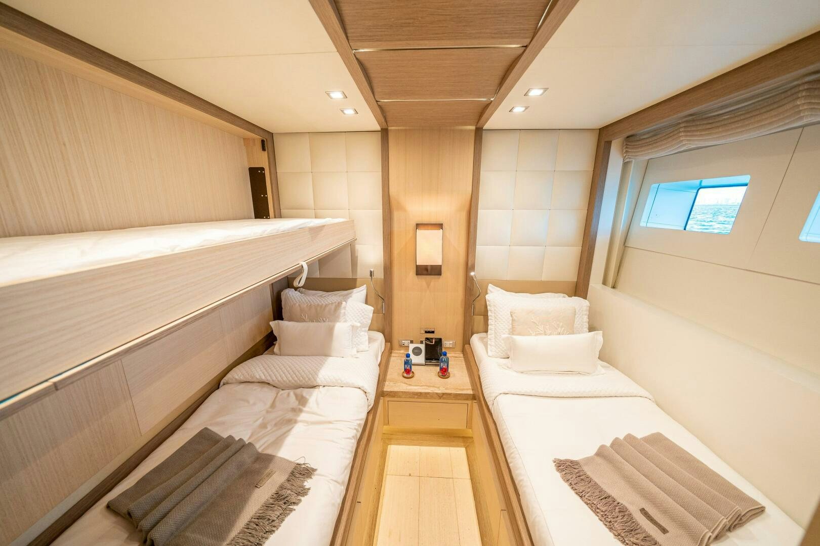 a room with a bed and a window aboard LEUDIN I Yacht for Sale