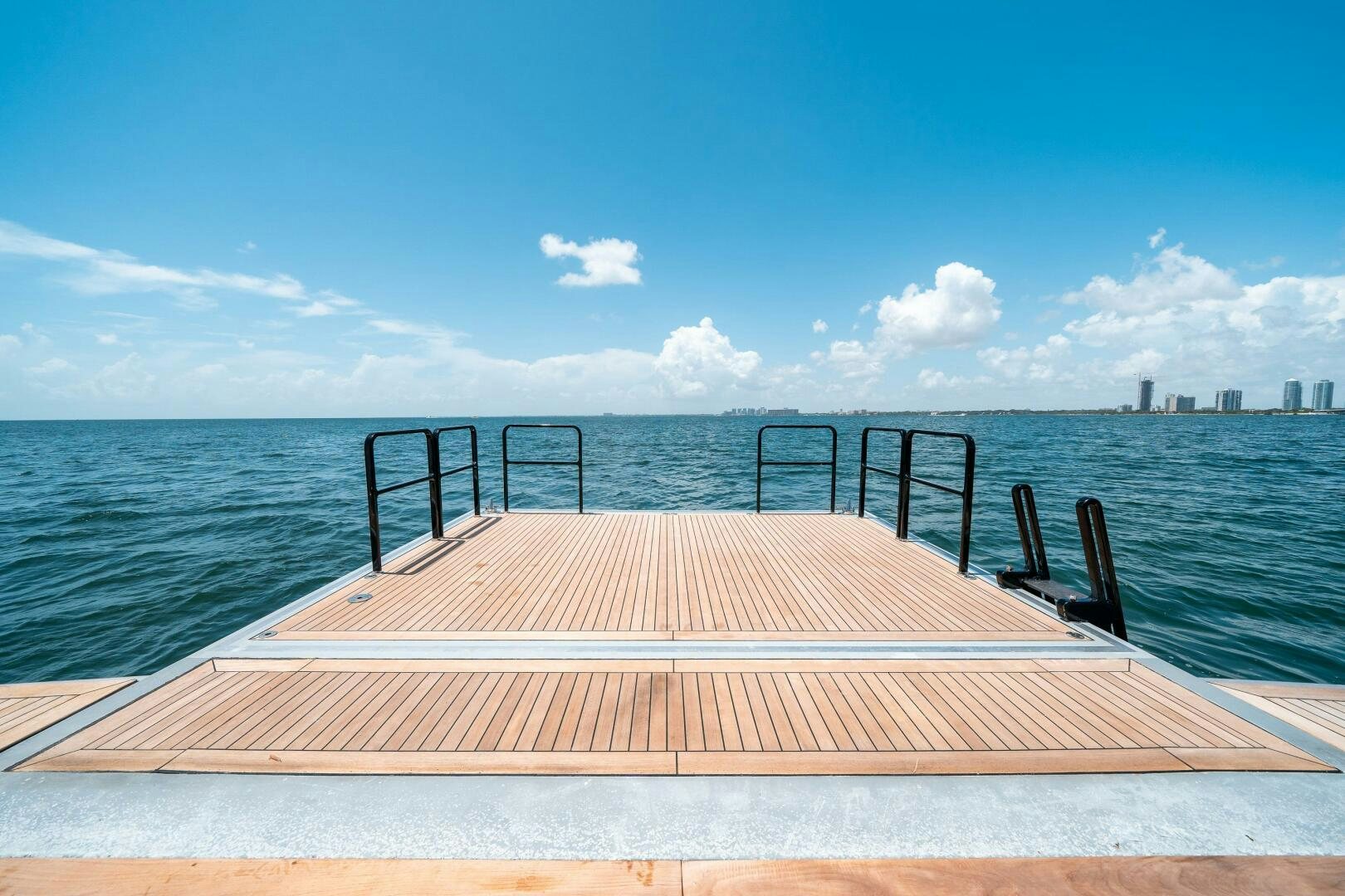 a wooden dock over the water aboard LEUDIN I Yacht for Sale
