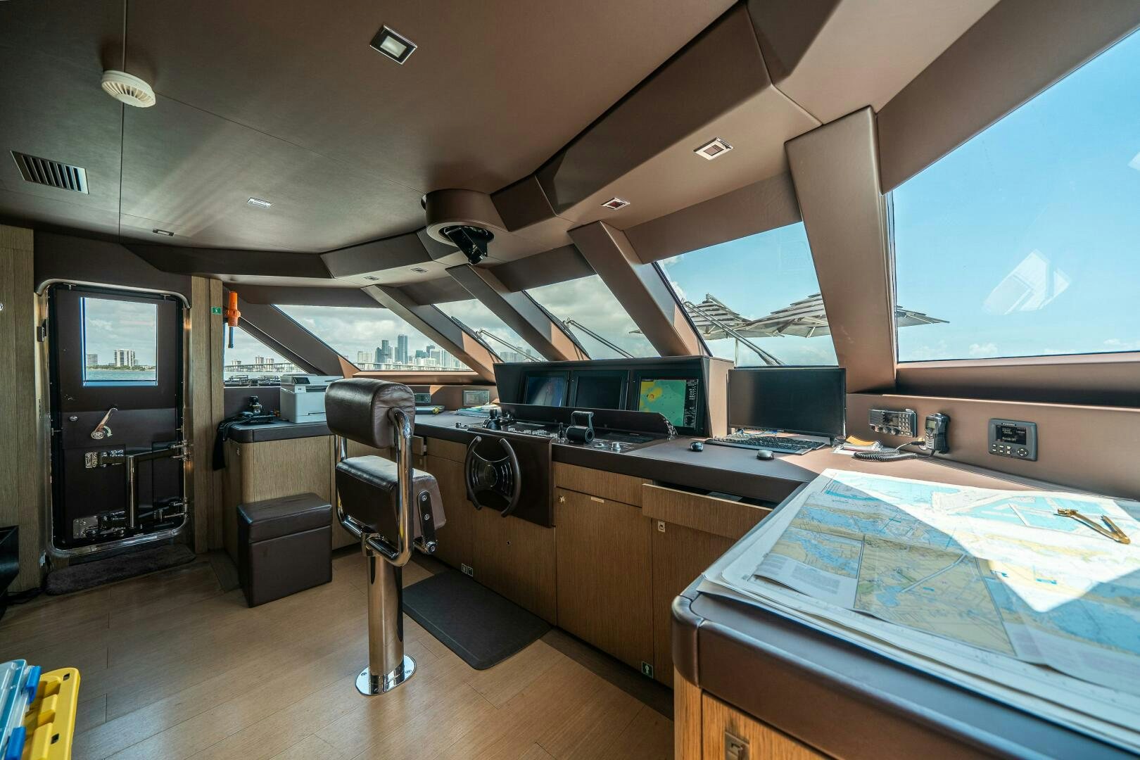 a room with a table and chairs aboard LEUDIN I Yacht for Sale