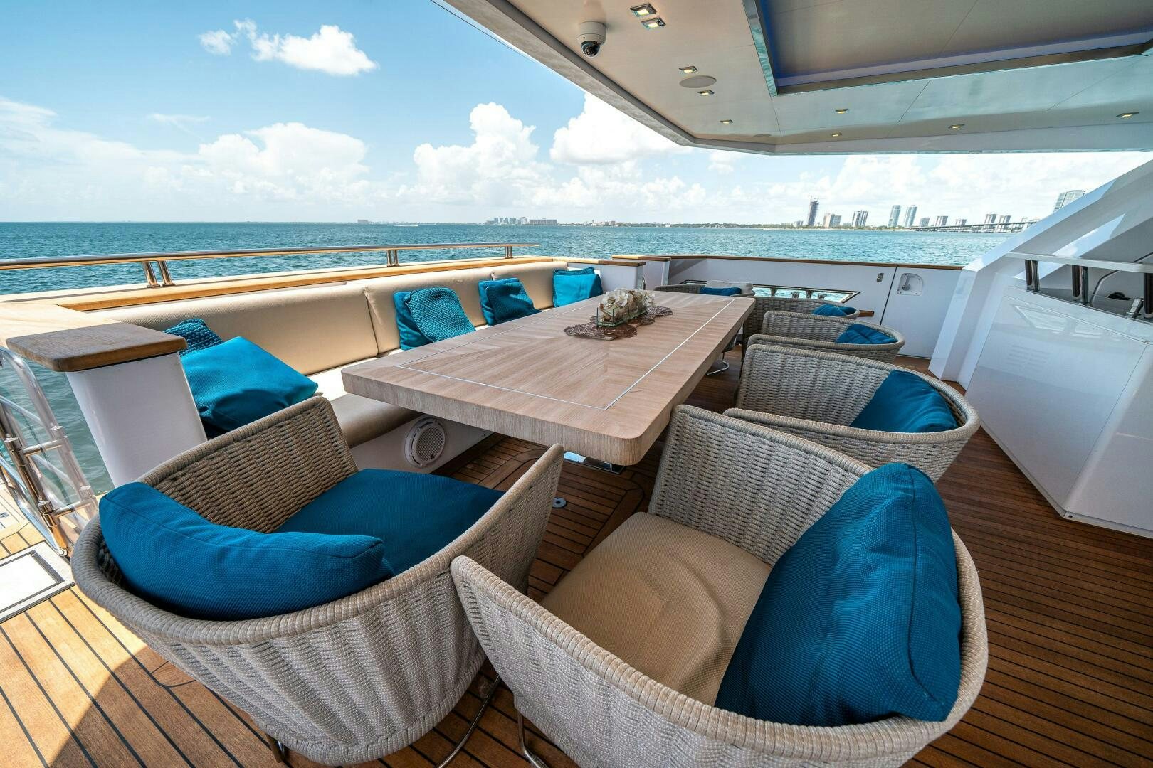 a deck with a view of the ocean and the ocean aboard LEUDIN I Yacht for Sale