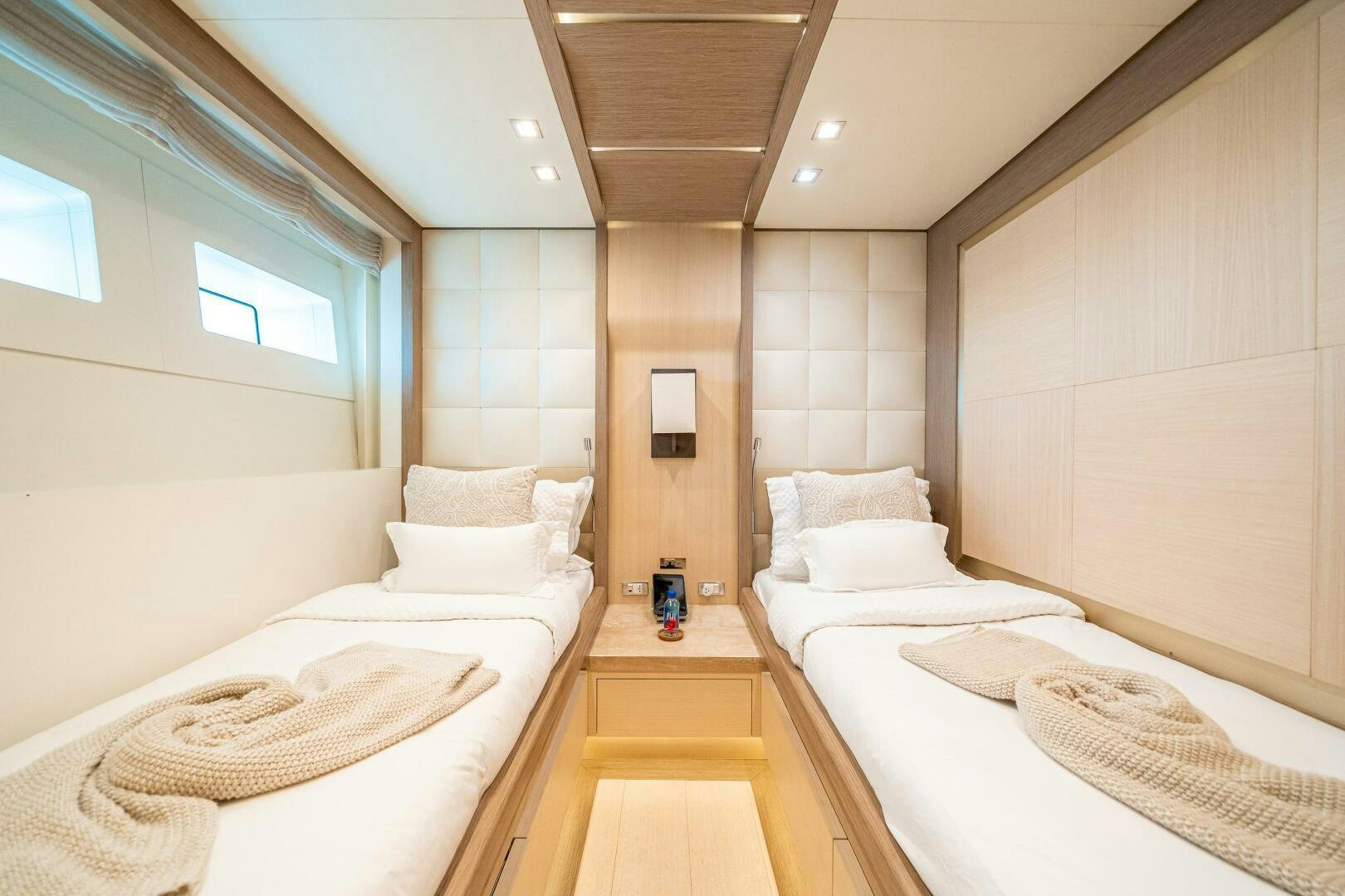 a room with a couple of beds aboard LEUDIN I Yacht for Sale